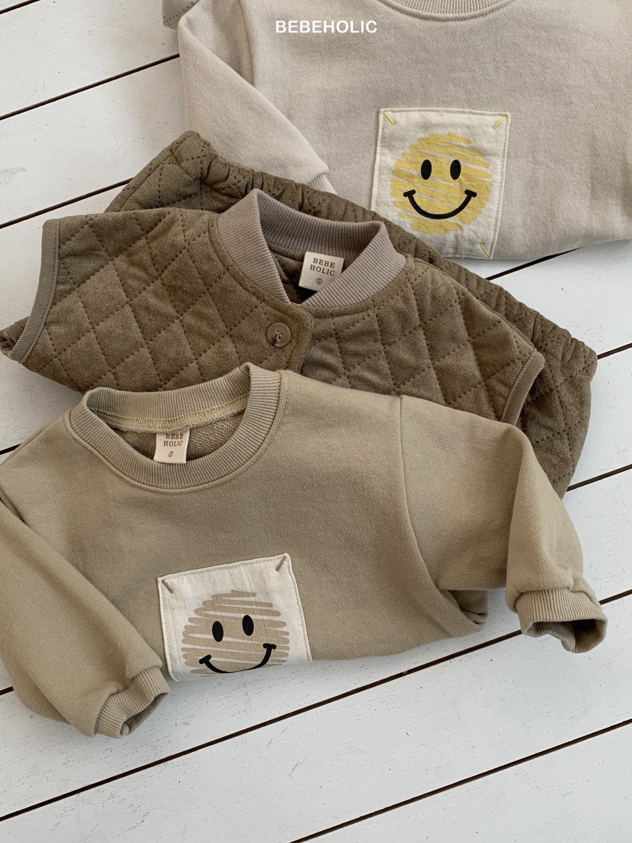 🌸預訂 韓國直送🌸🇰🇷BEBEHOLIC兩色笑哈哈圖案長袖包屁衣