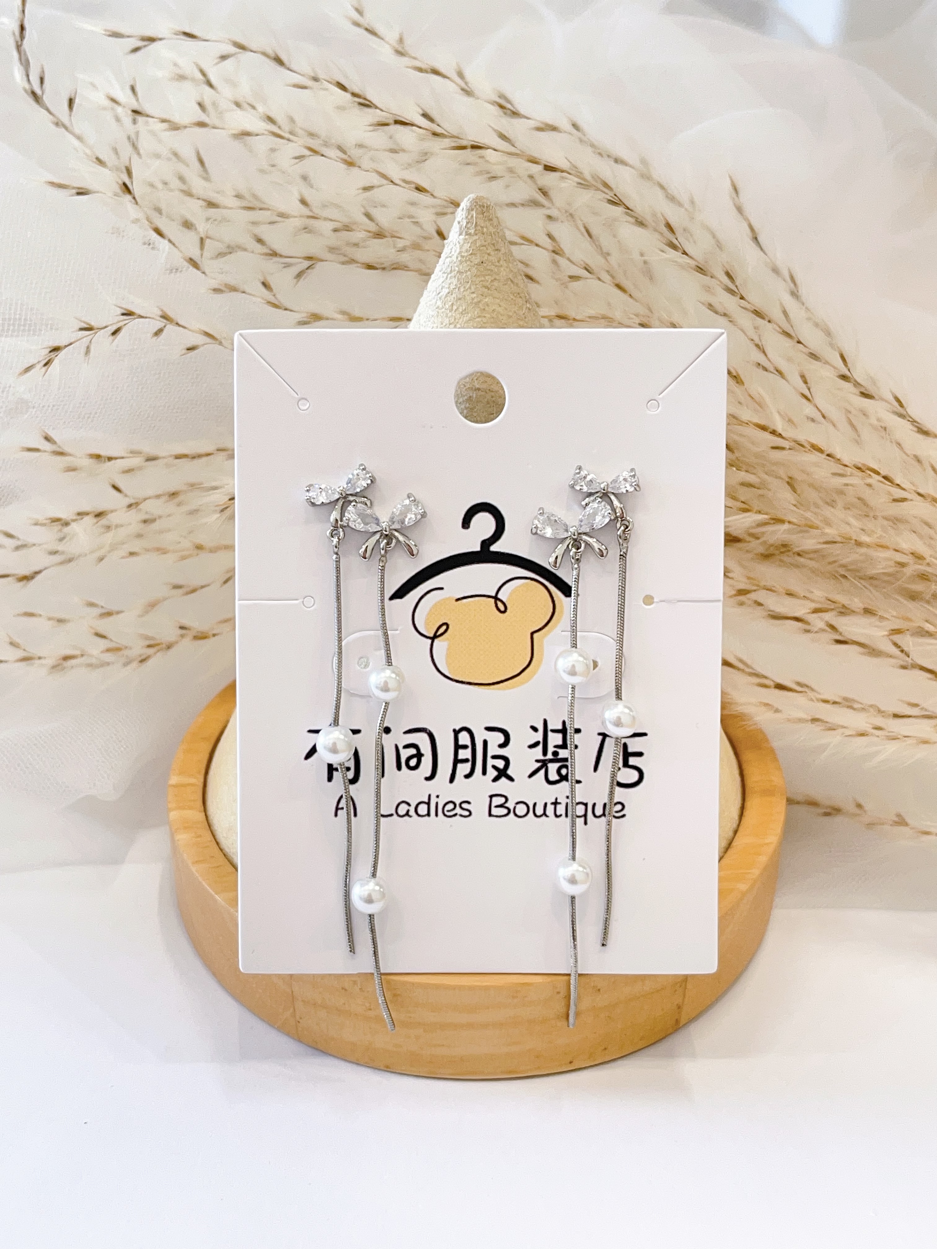 温柔风双蝴蝶结珍珠流苏耳环