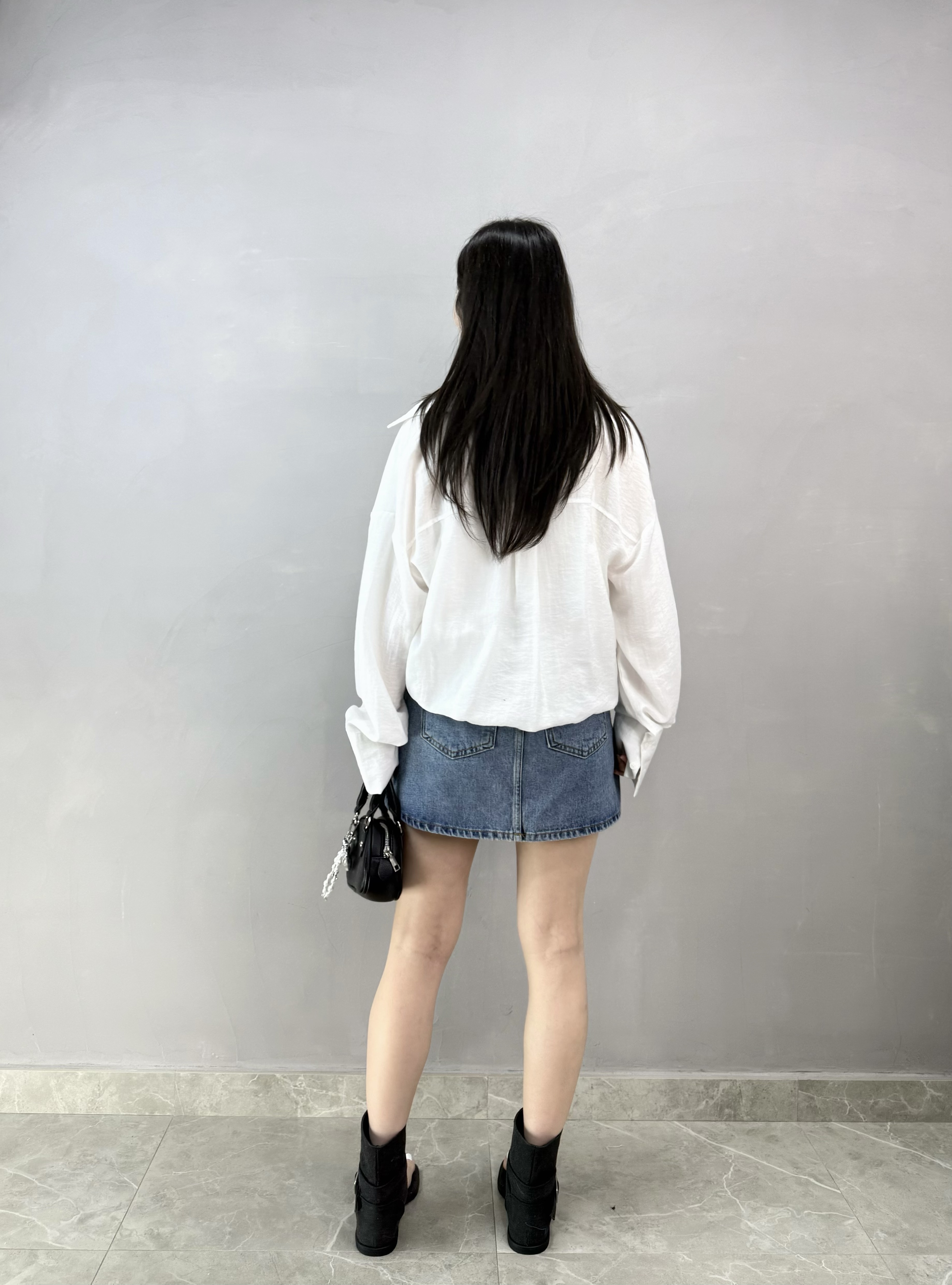 I75 側扣車骨牛仔裙褲