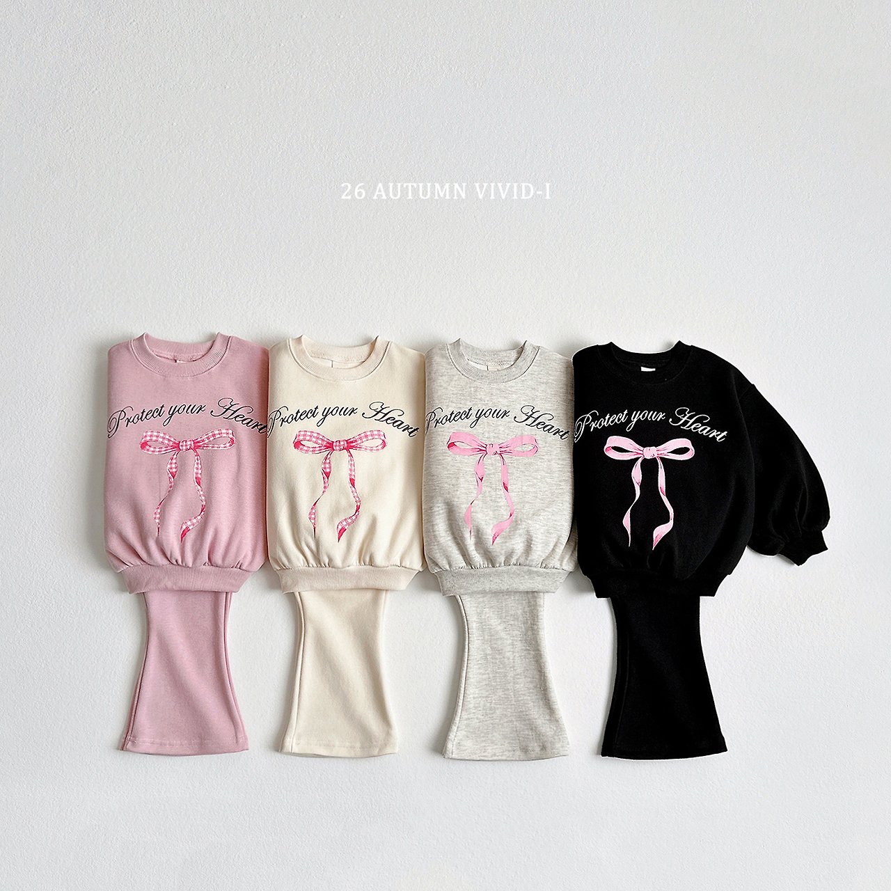 Vivid | Pink ribbon up and down