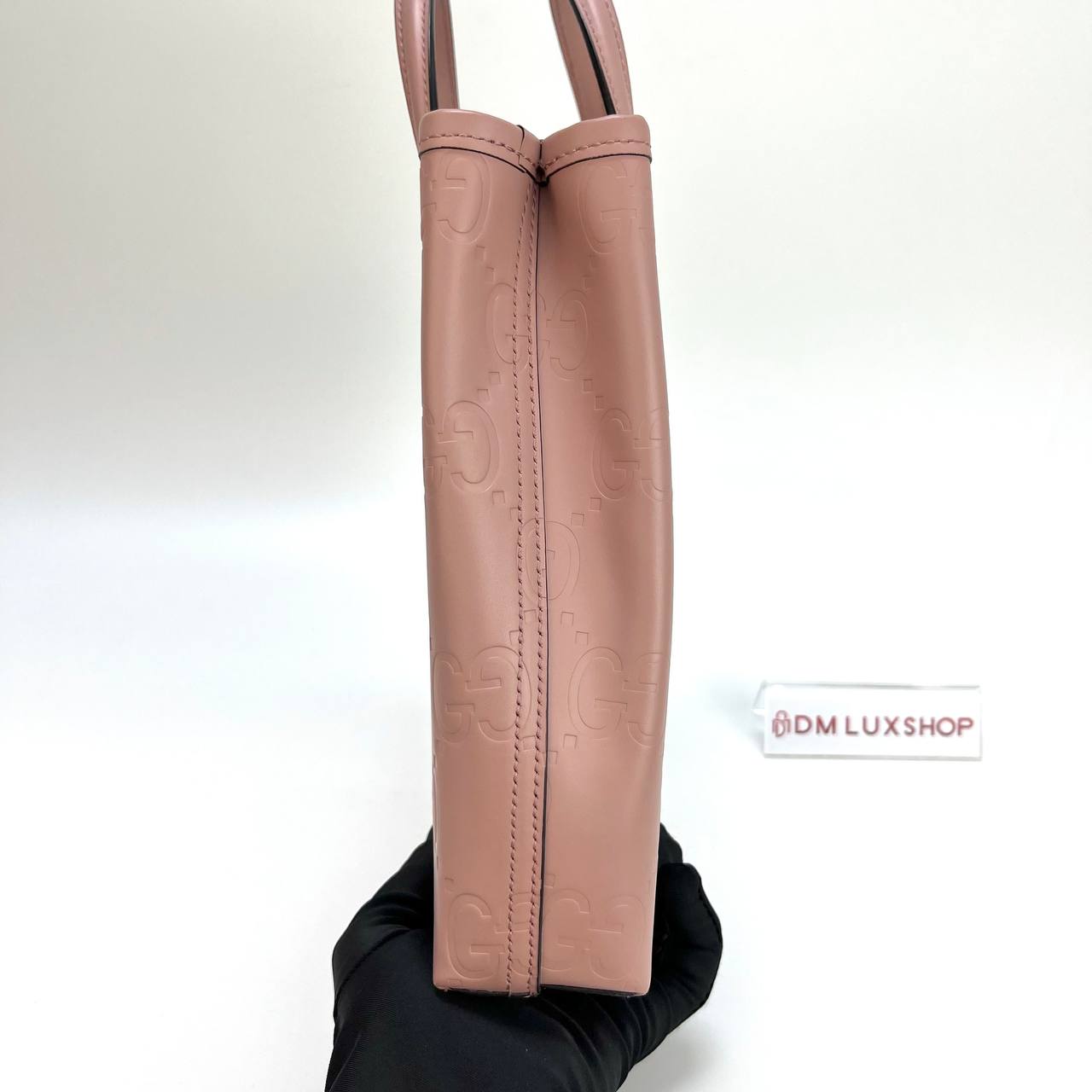 Gucci Pink GG Embossed Vertical Mini Tote