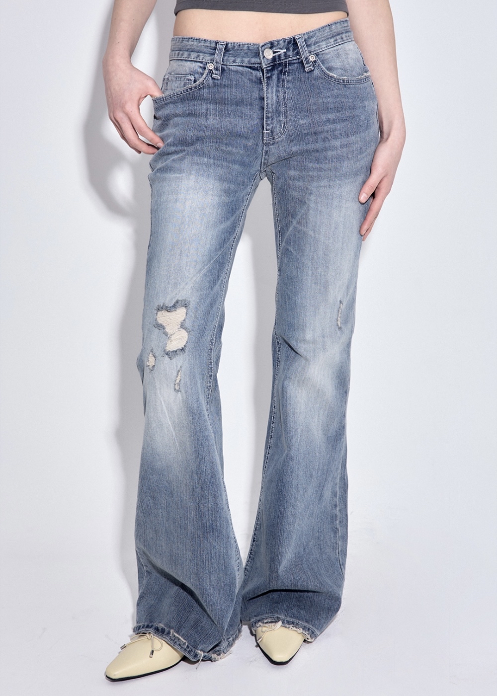 Low-Rise Distressed Bootcut Denim