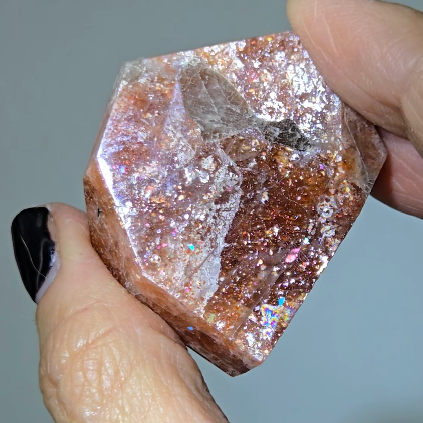 Arusha sunstone with rainbow glitter, smoky quartz inclusions - SM61