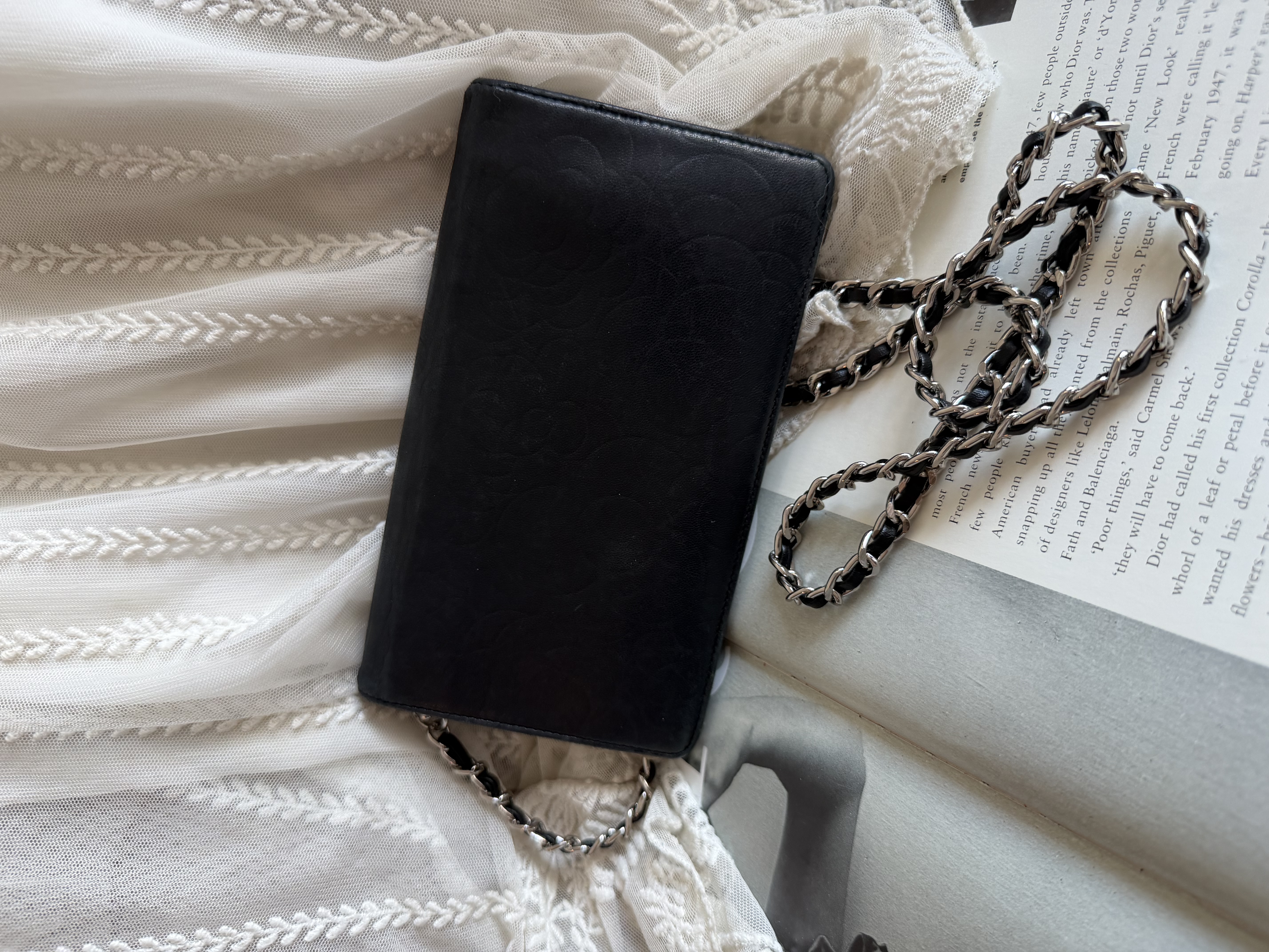 Chanel black leather camellia wallet