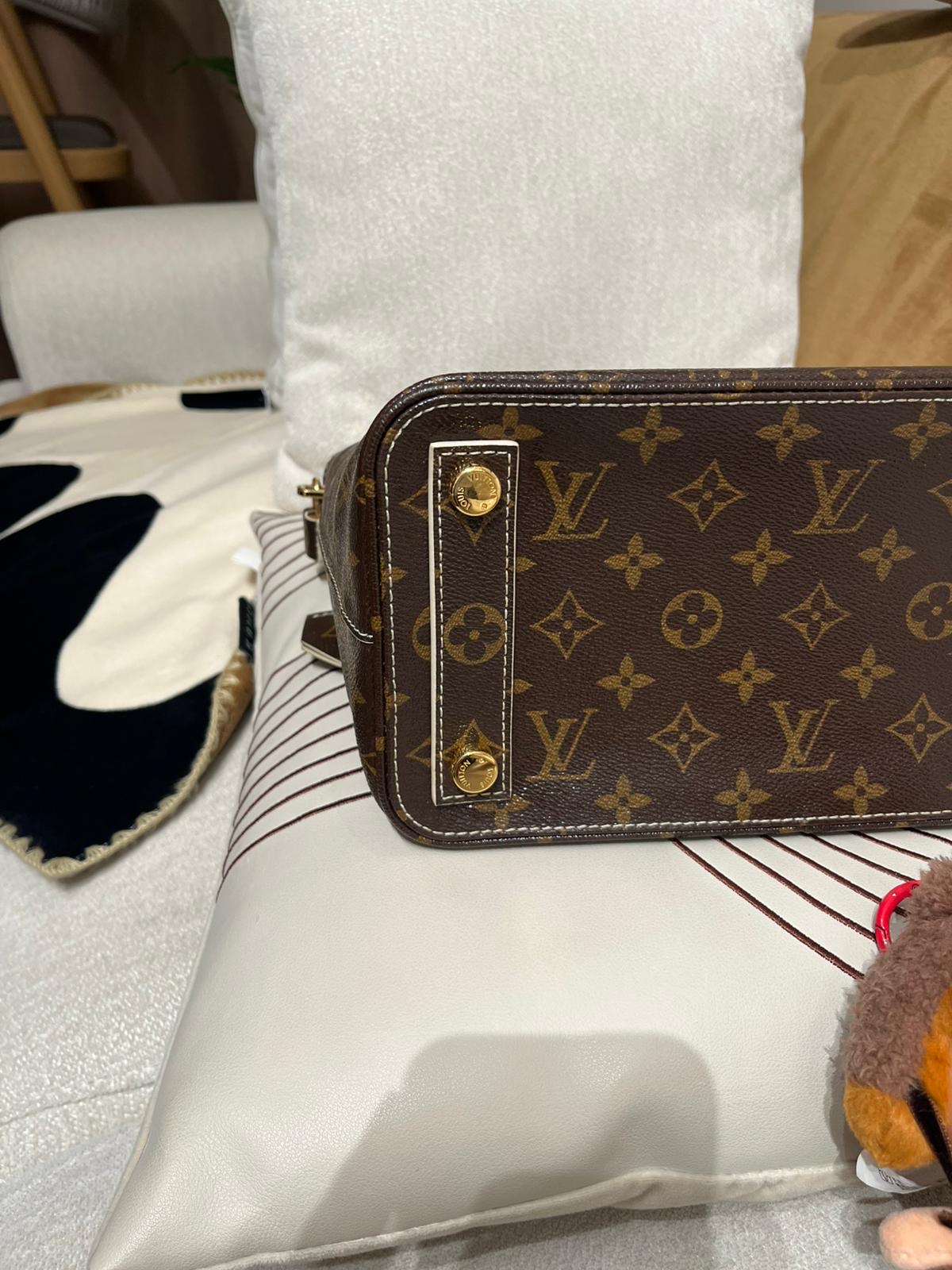 Lv lockit limited edition  100%Authentic,95%new  ✅key lock ✅dust bag 