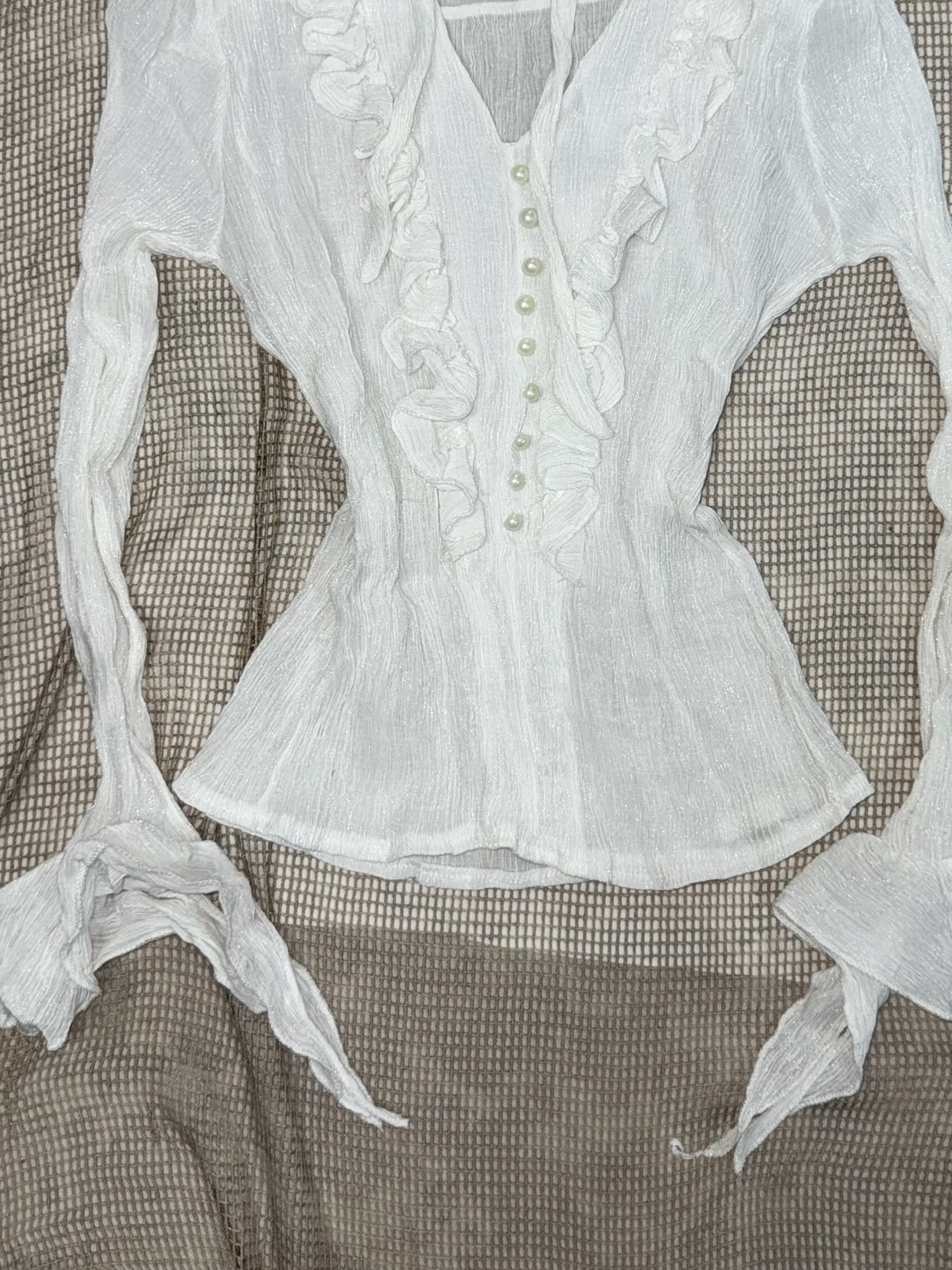 White Ruffled Peplum Blouse