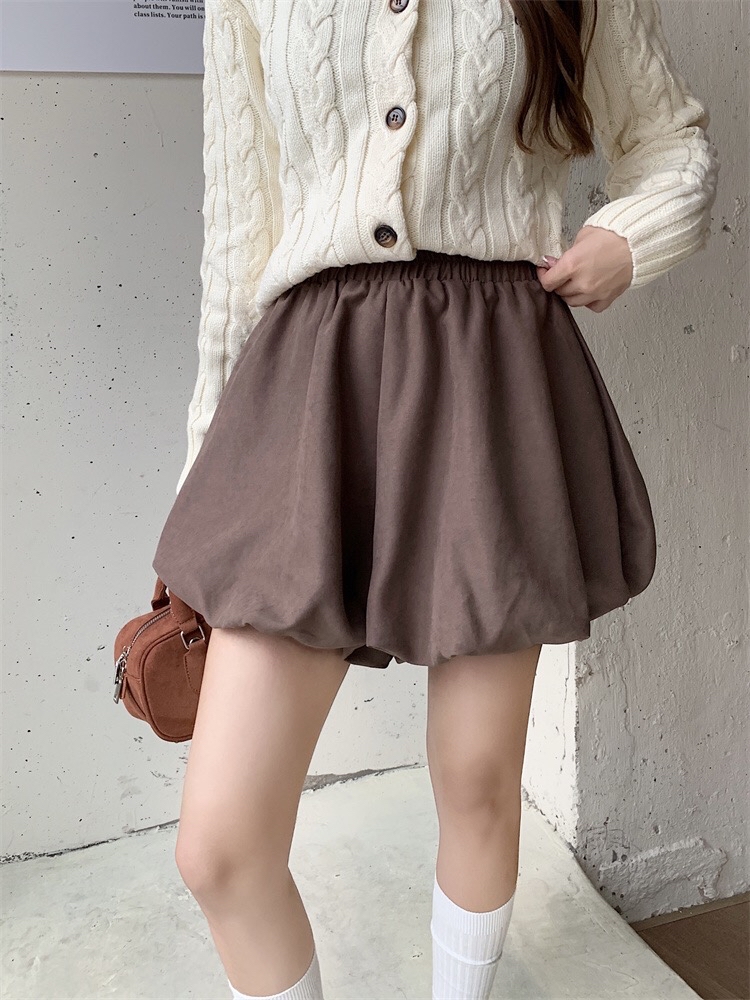 B229(8003) 韩版甜美休闲风松紧腰下摆花苞边黑咖短裙