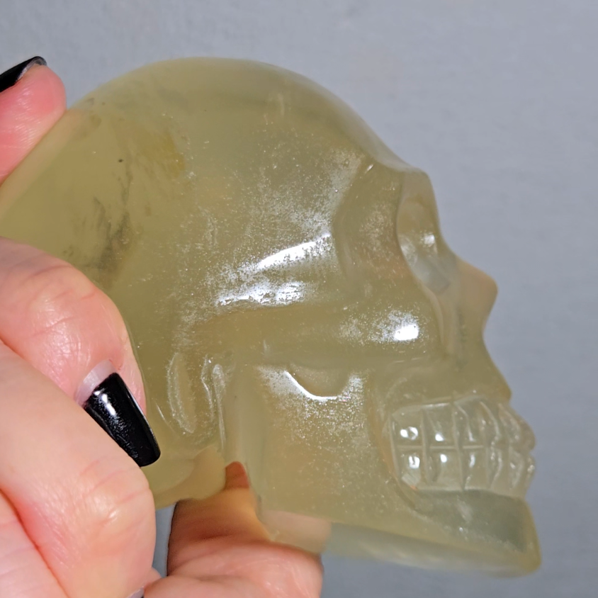 Citrine skull with rainbows and multiple star flash asterism - C59