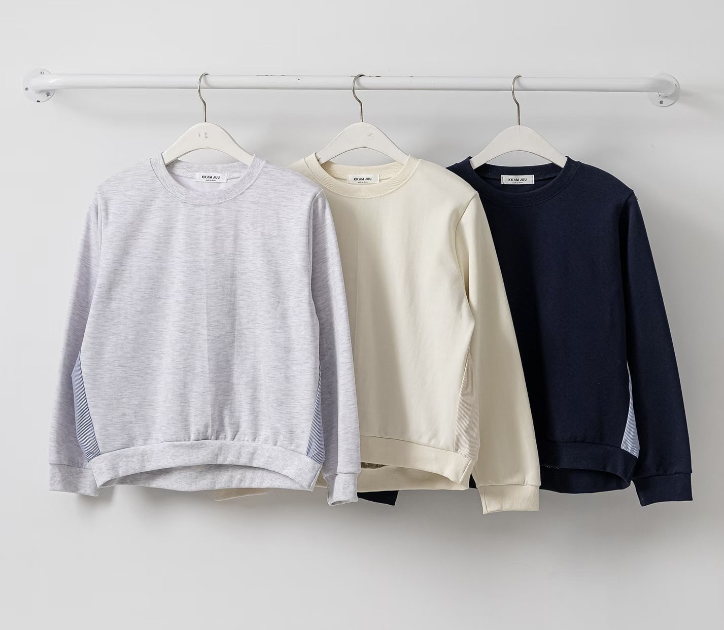 簡約拼條子圍衣