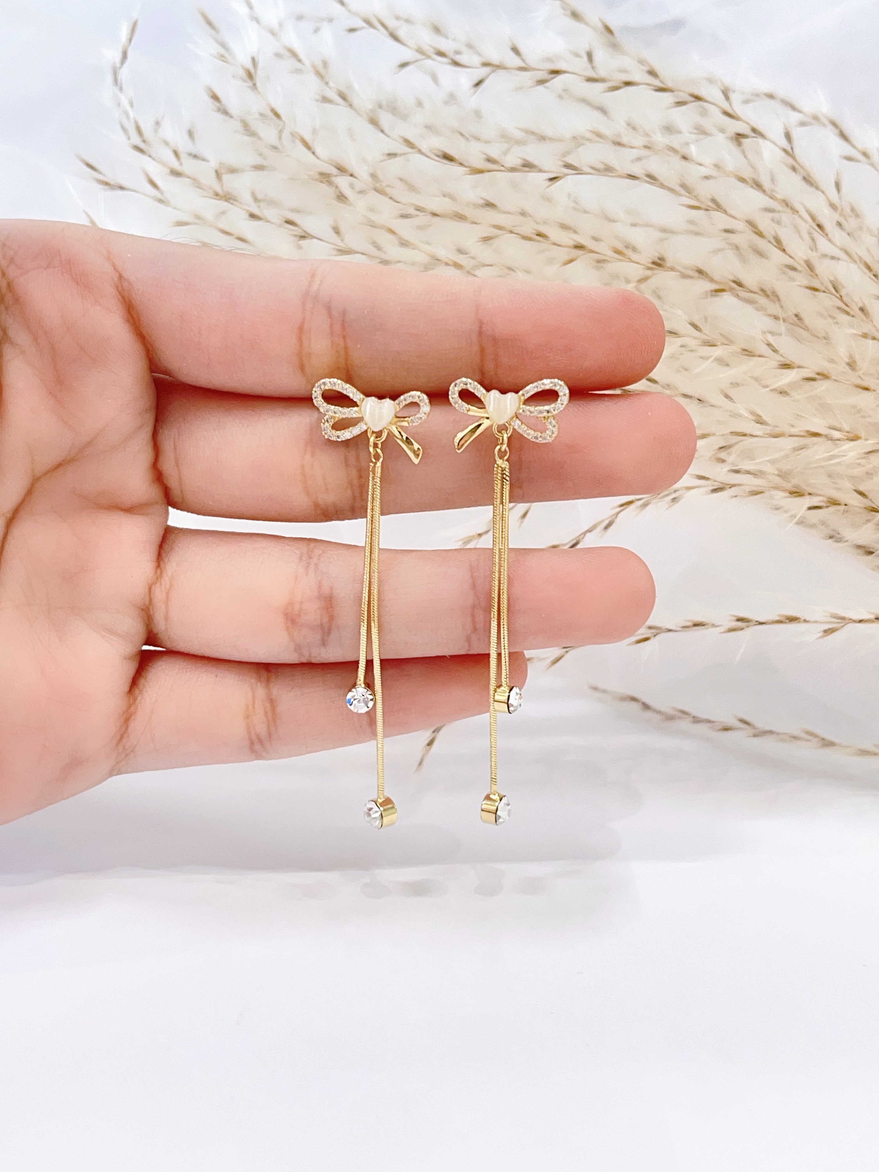 小可爱蝴蝶结流苏耳环