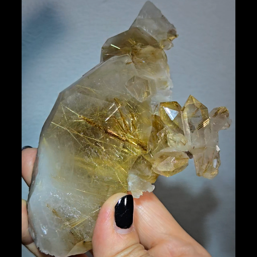 Golden titanium rutiles on black hematite in quartz cluster - RT1443