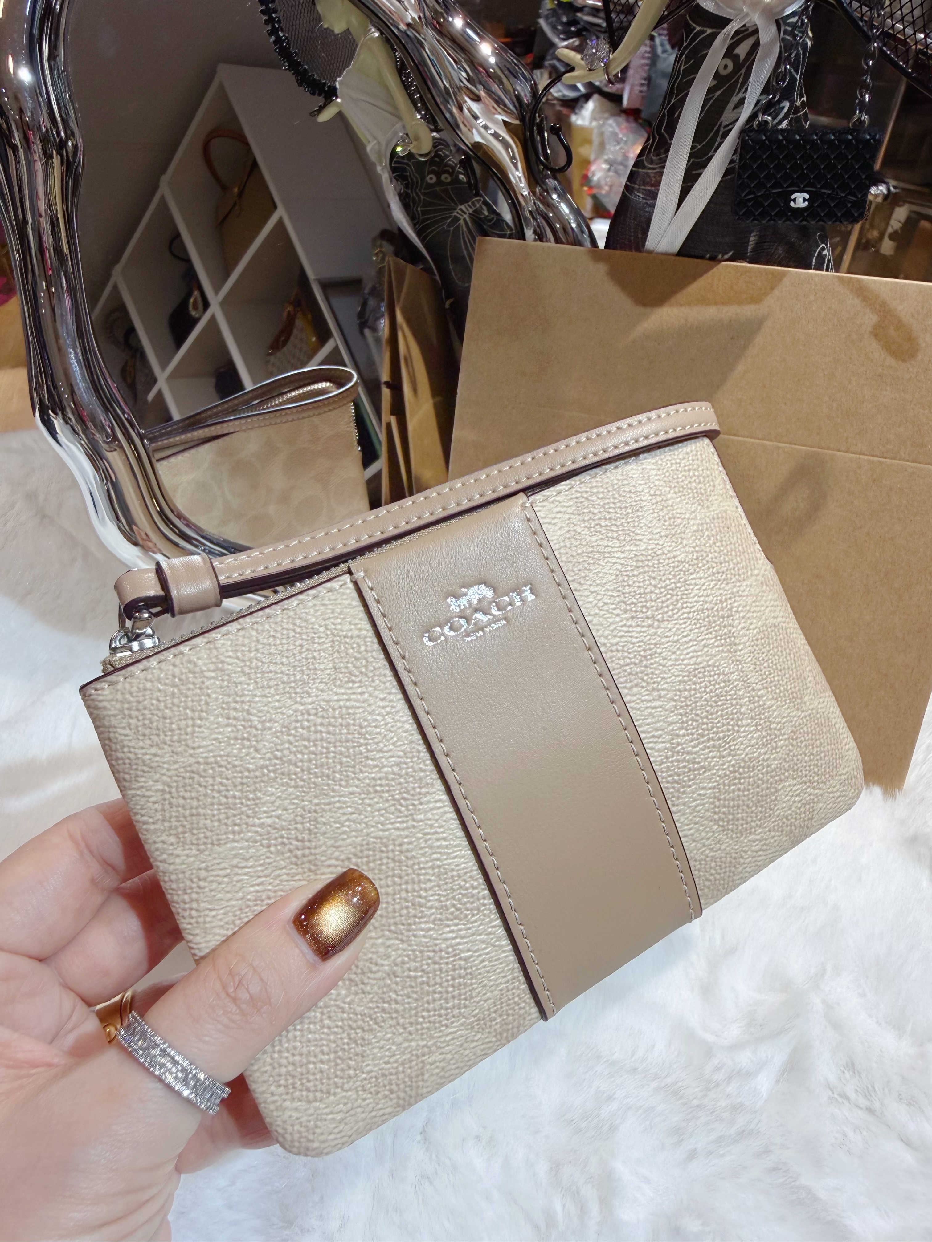 Coach wristlet  milk tea/m