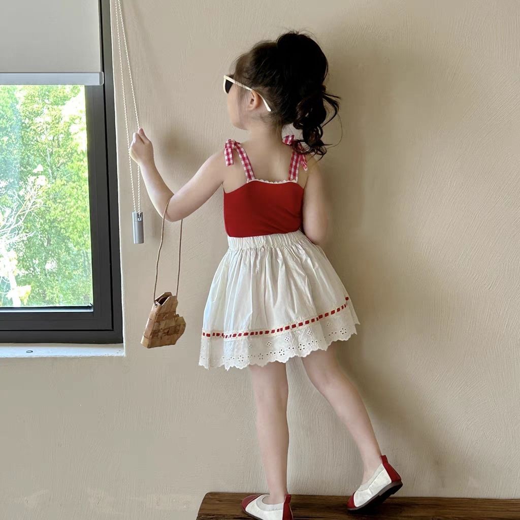 541744 | Girls' Adorable Red Top and White Skirt Set with Cherry Accents