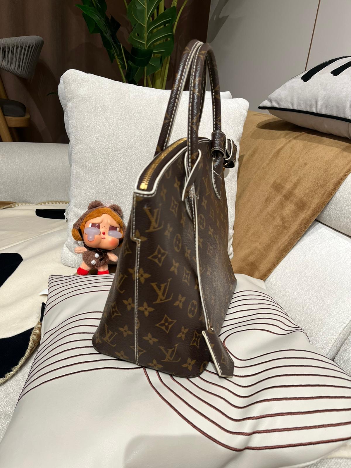 Lv lockit limited edition  100%Authentic,95%new  ✅key lock ✅dust bag 