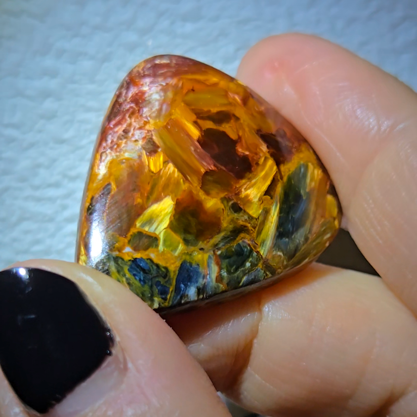 Red, gold, and blue pietersite cabochon - PT10