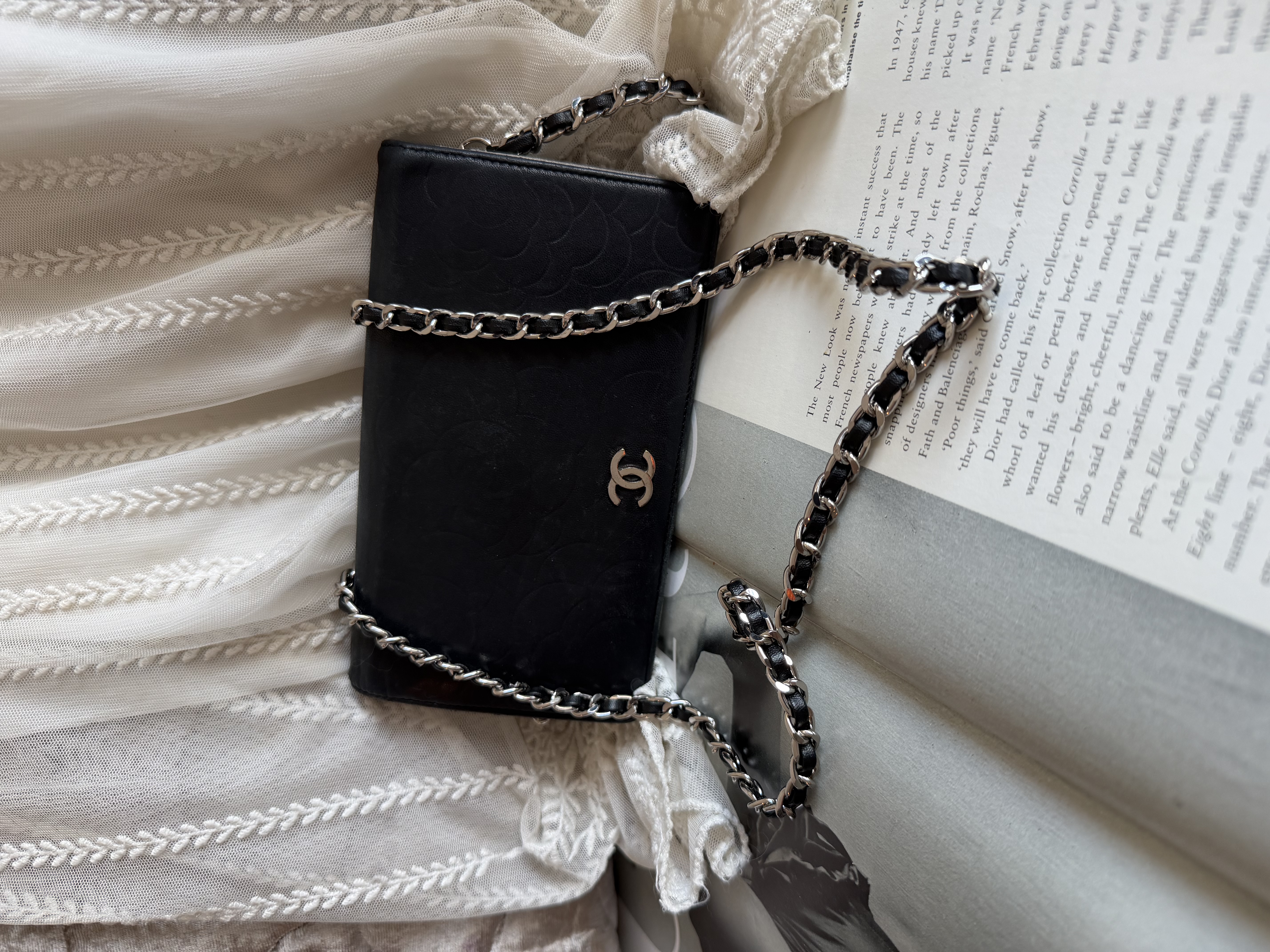 Chanel black leather camellia wallet