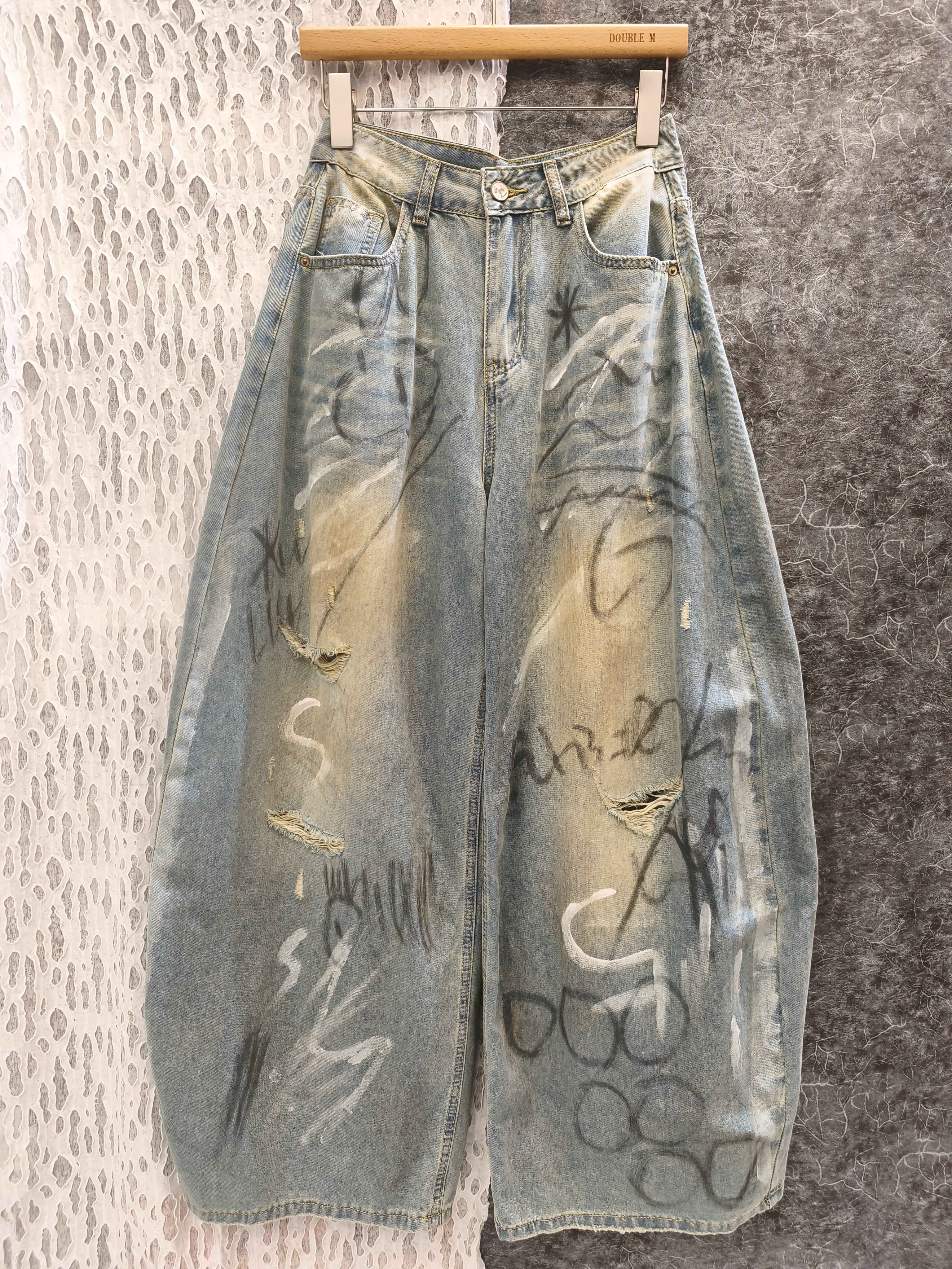 塗鴉彎刀牛仔褲