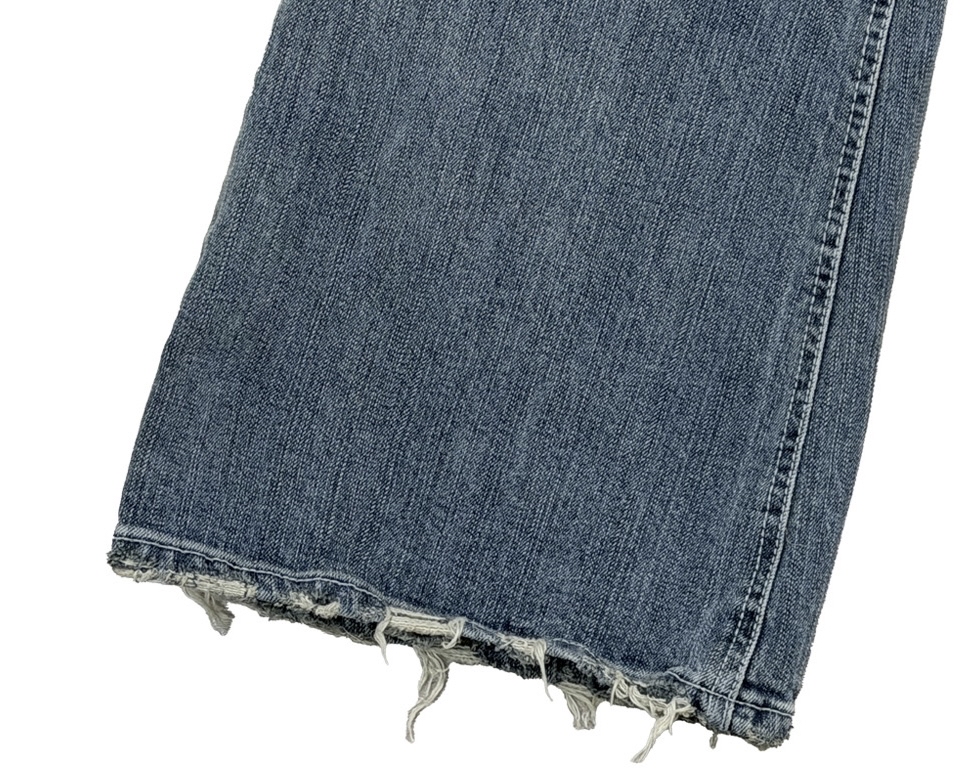 Low-Rise Distressed Bootcut Denim