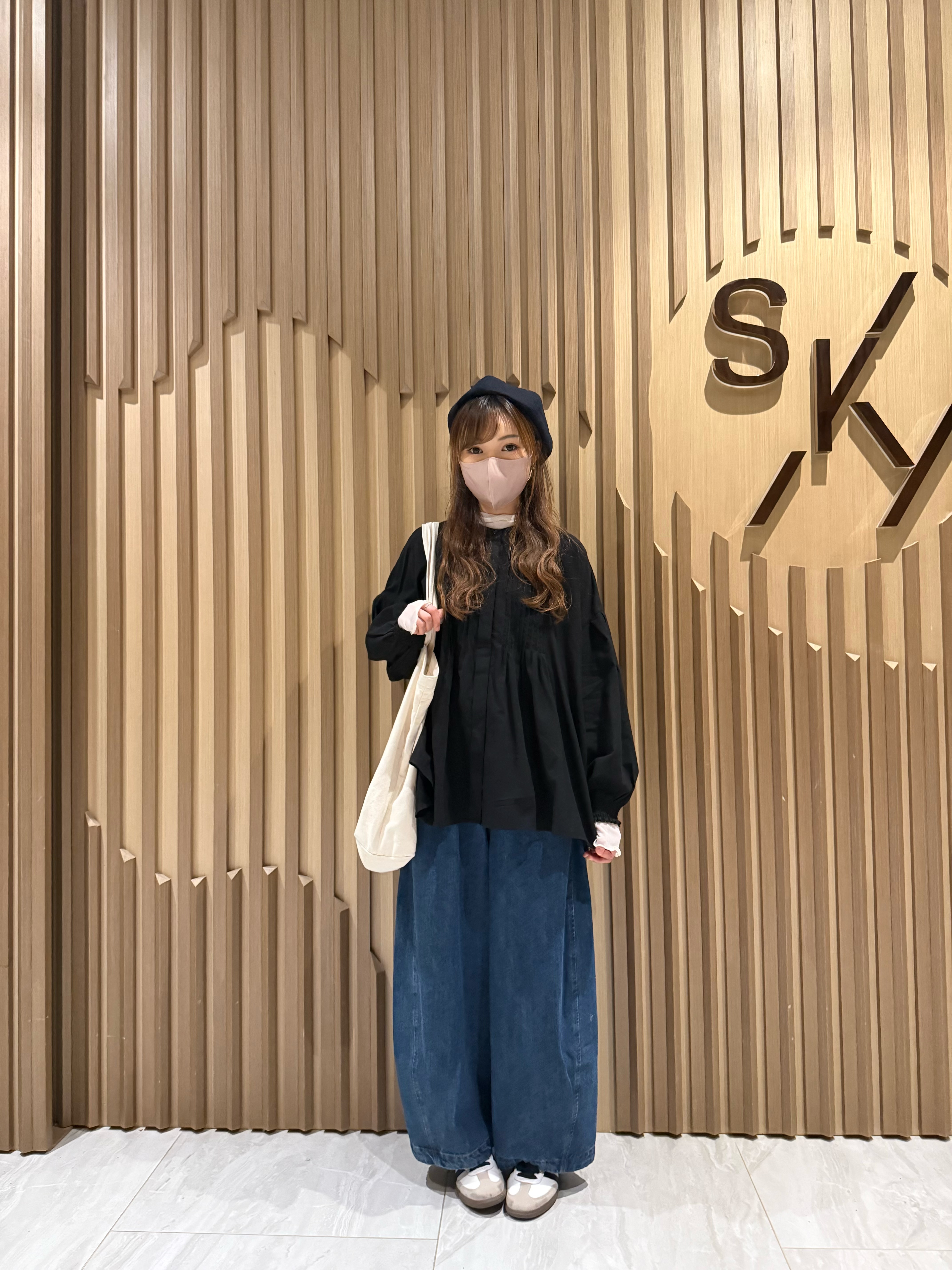 洗水彎刀牛仔褲