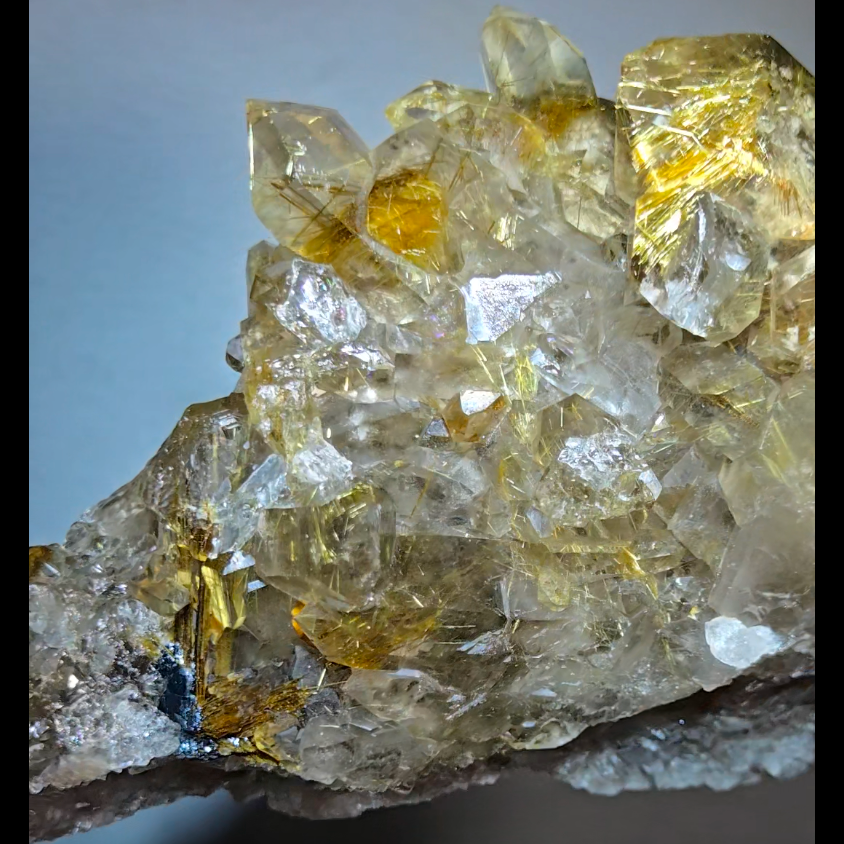 High-grade golden starburst rutiles on black hematite in quartz - RT1434