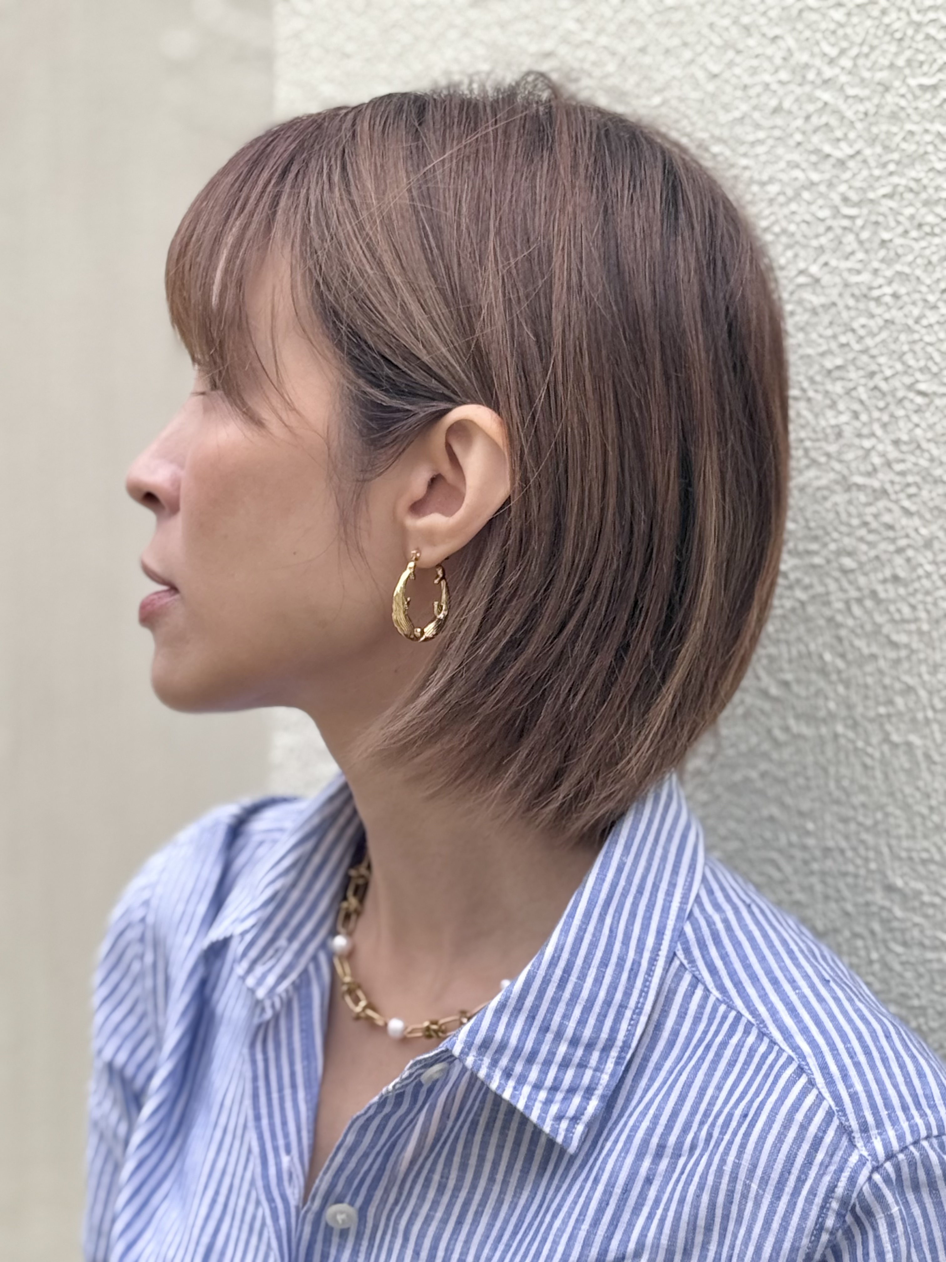 Gold dolphins stainless earring