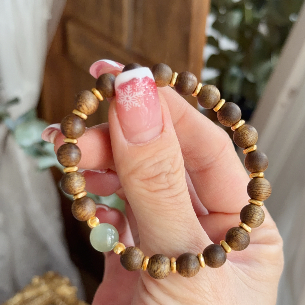 999足金襯6mm越南沉香手串