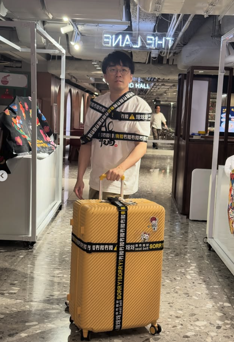 SORRY！冇扣 行李安全帶