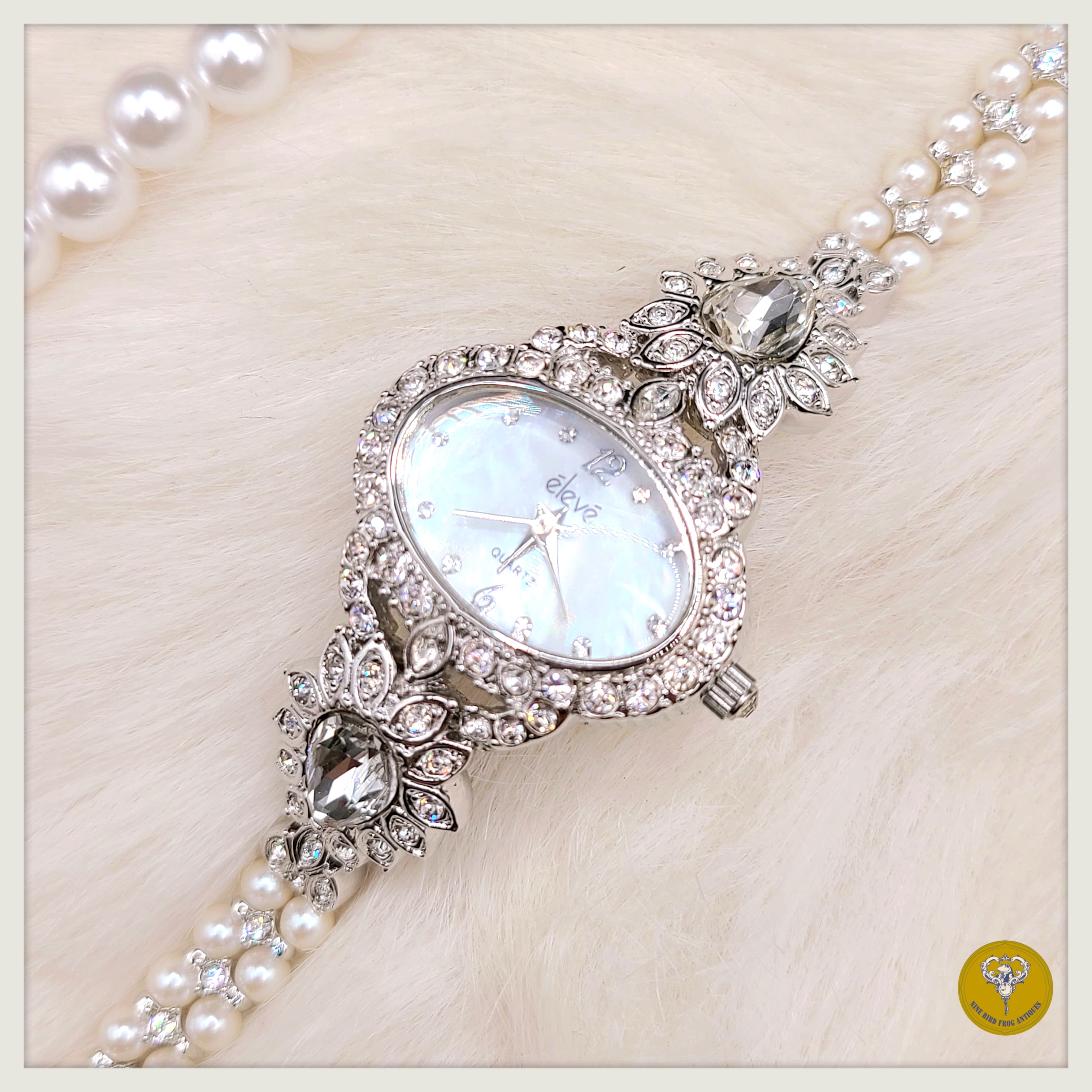 Eleve 水晶貝母珍珠石英錶