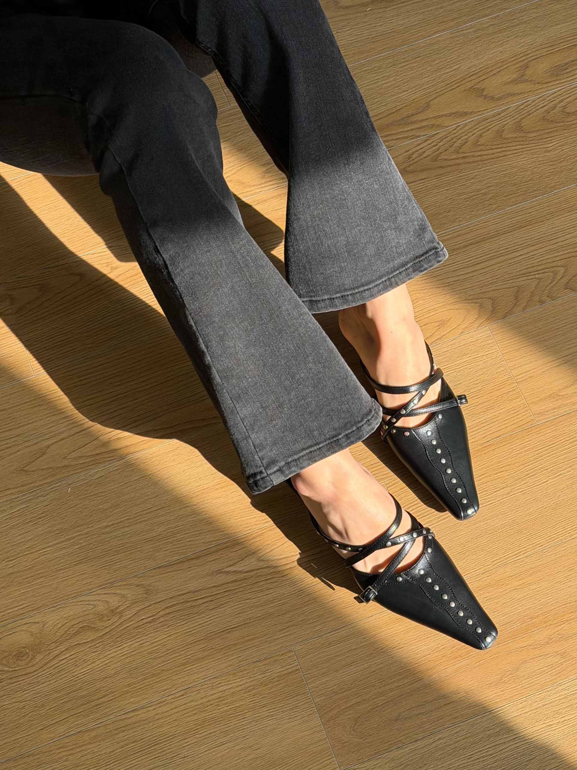 Stylish studs pointy mules