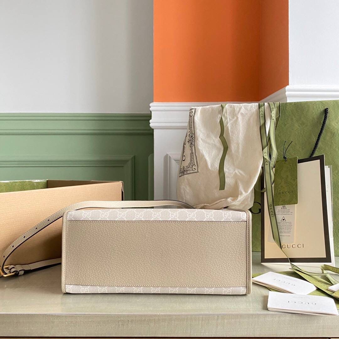 👜独家特级正品 g 659983 这款结构挺括的小号托特包采用gg supreme帆布制作，搭配燕麦色皮革滚边， 提供顶部提手和肩带双重携带选择。米色白色gg supreme帆布，环保材料，饰燕麦色皮革滚边❤️