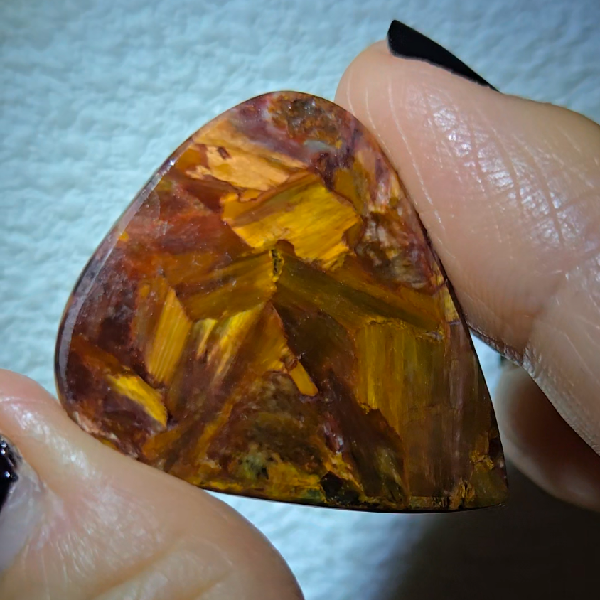 Red, gold, and blue pietersite cabochon - PT10