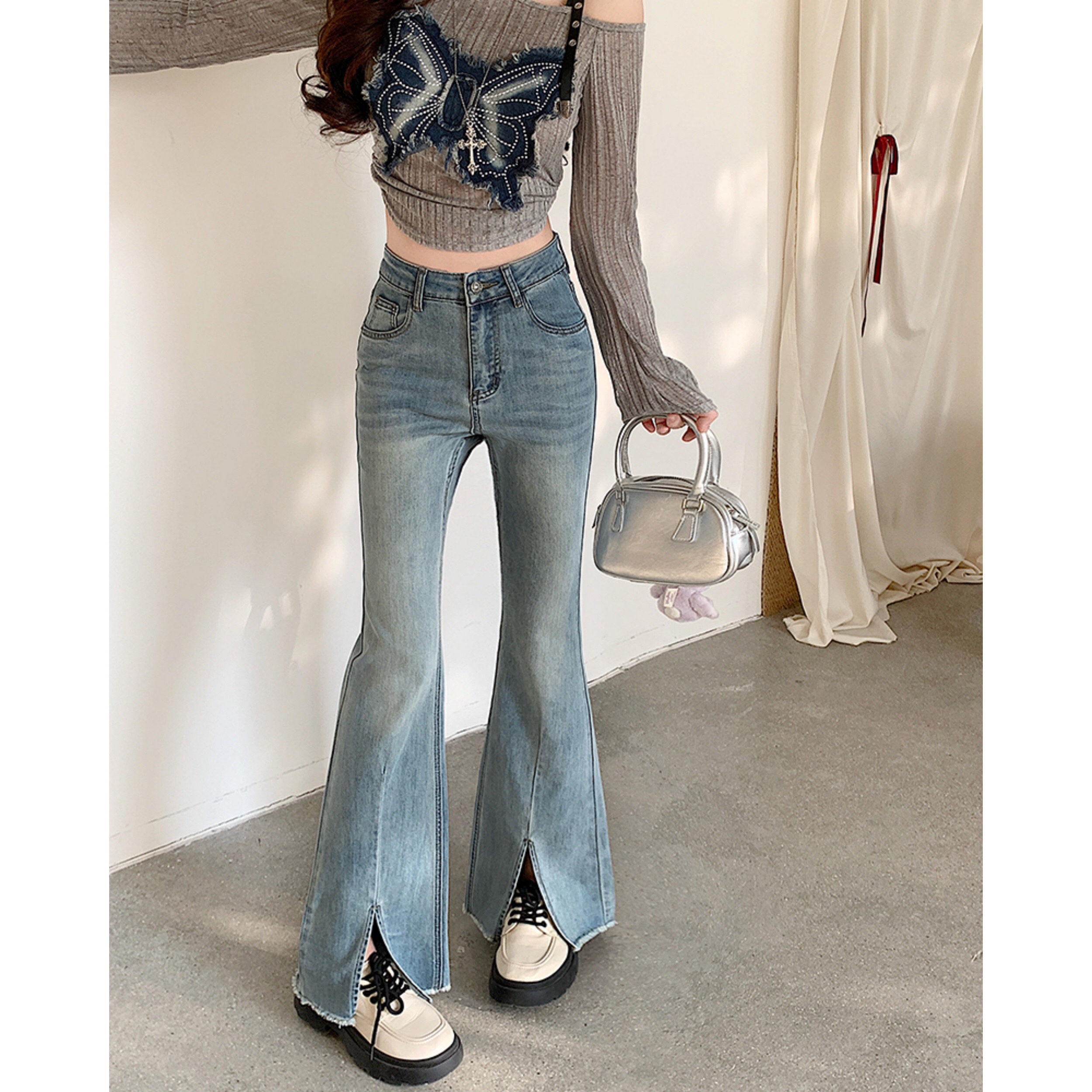 B338(65520) 韩版JEANS复古显瘦高腰微喇下摆开角浅蓝长裤 