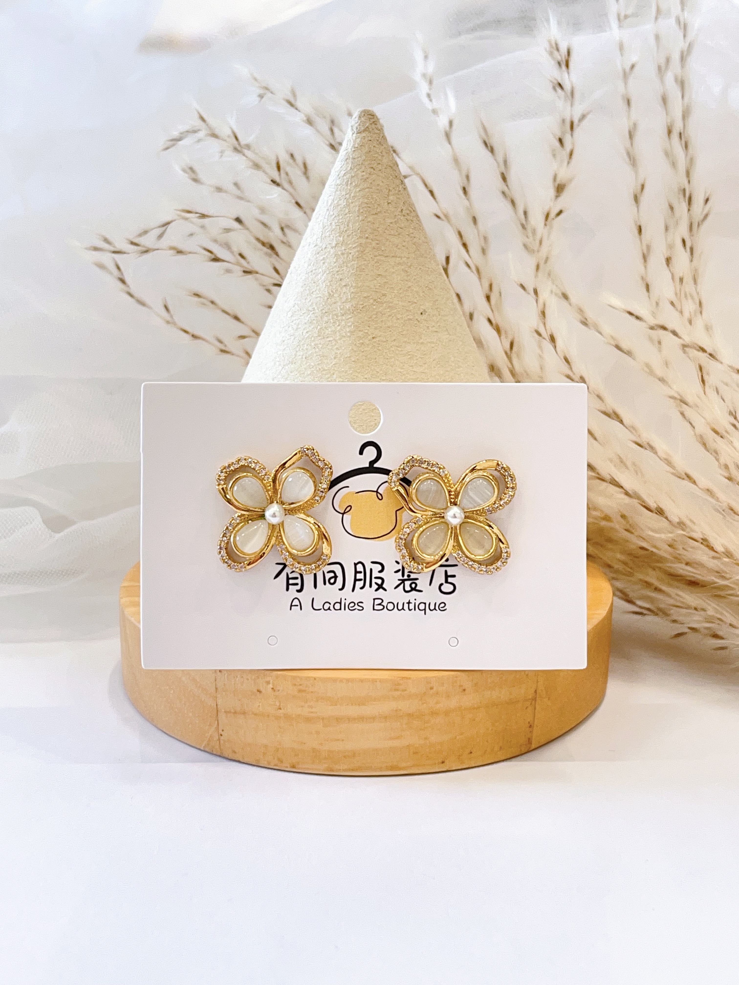 个性猫眼花朵百搭耳环