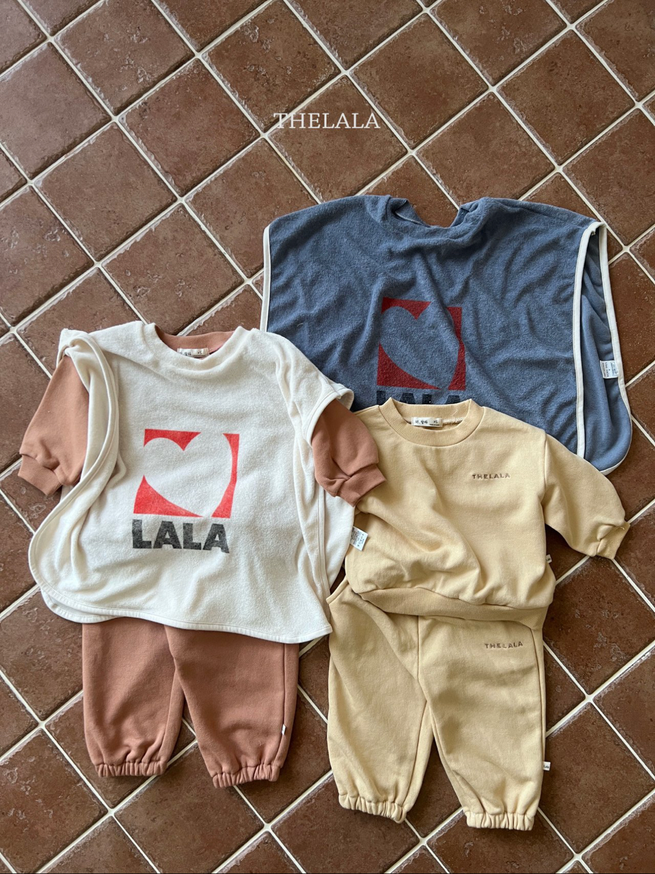 🌸預訂 韓國直送🌸🇰🇷THELALA兩色愛心標誌印花寬鬆背心