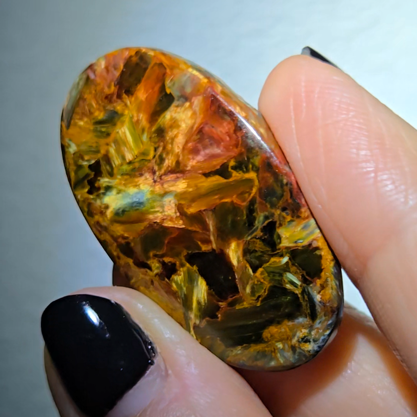 Red, blue and gold pietersite cabochon from Namibia - PT8