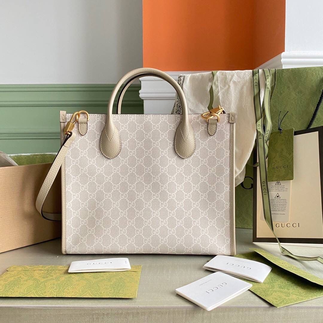 👜独家特级正品 g 659983 这款结构挺括的小号托特包采用gg supreme帆布制作，搭配燕麦色皮革滚边， 提供顶部提手和肩带双重携带选择。米色白色gg supreme帆布，环保材料，饰燕麦色皮革滚边❤️