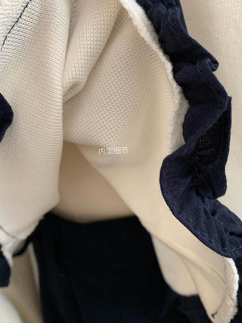 温柔风木耳边不规则波浪蝴蝶结上衣