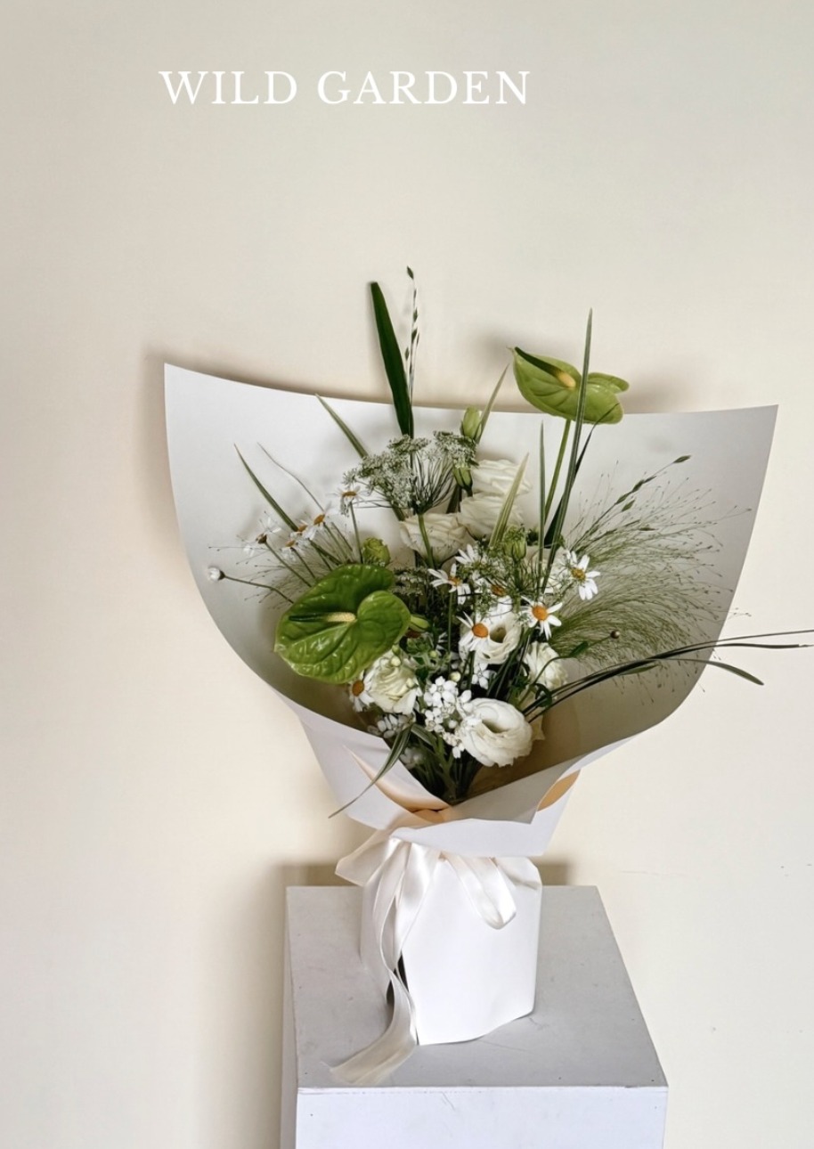 Elegant White Floral Bouquet with Green Accents