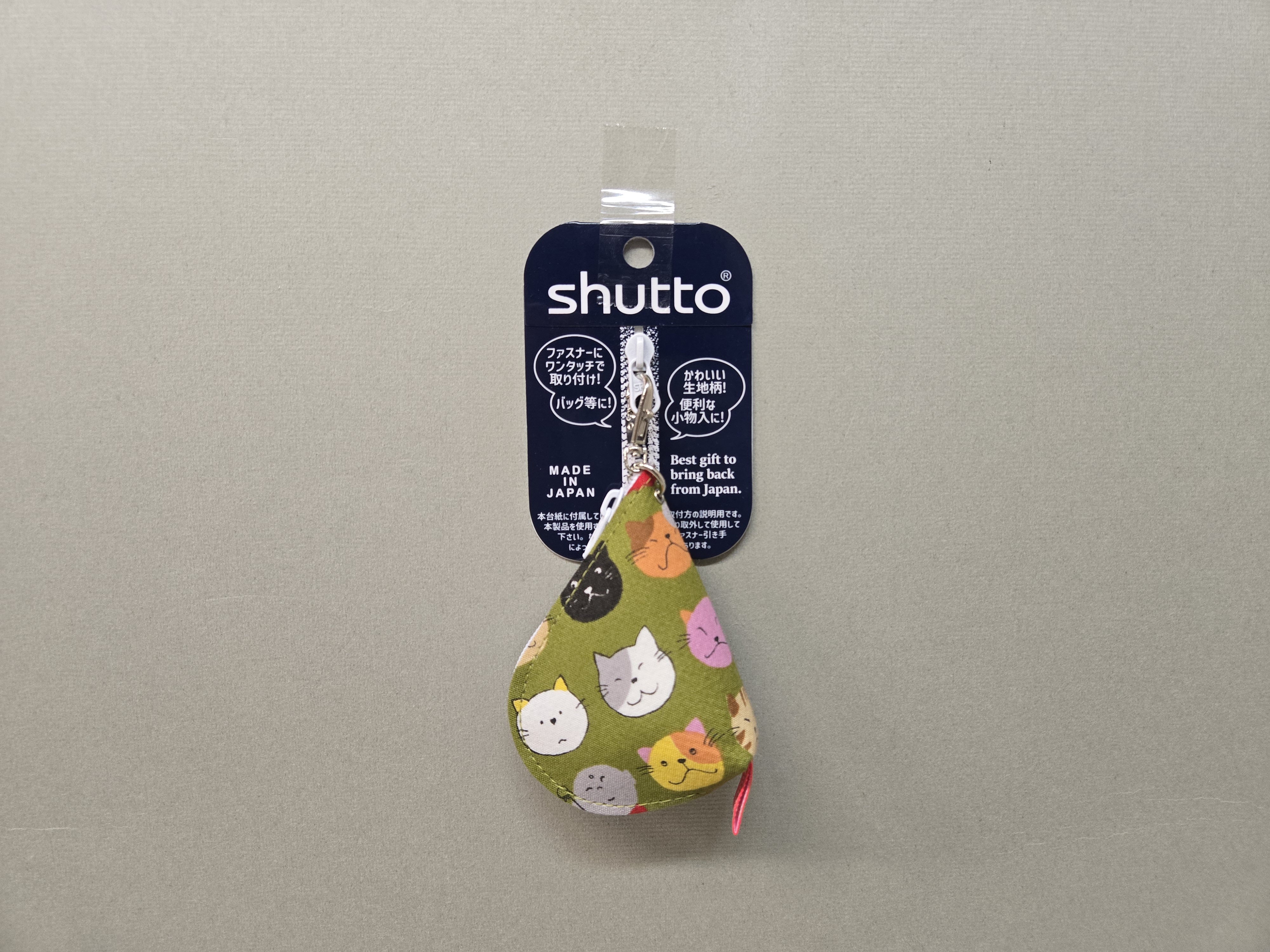 綠色底各種貓咪頭minipouch