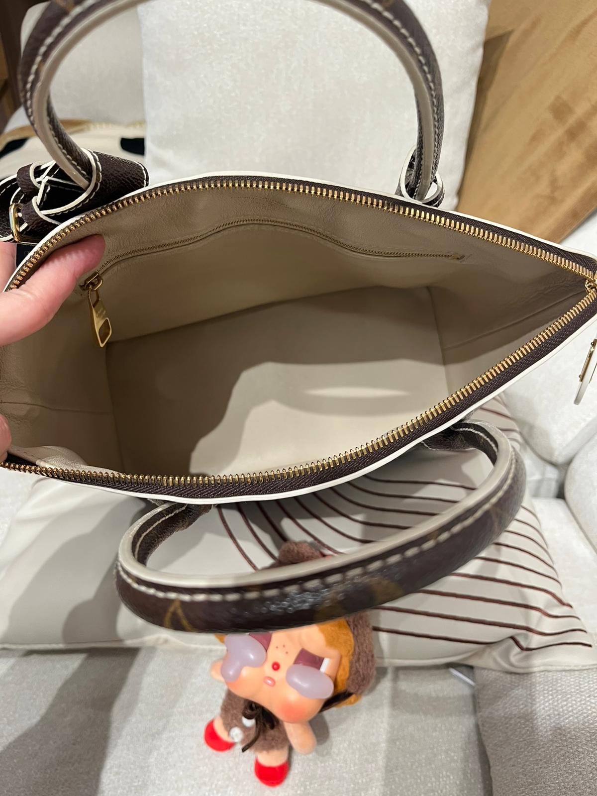 Lv lockit limited edition  100%Authentic,95%new  ✅key lock ✅dust bag 