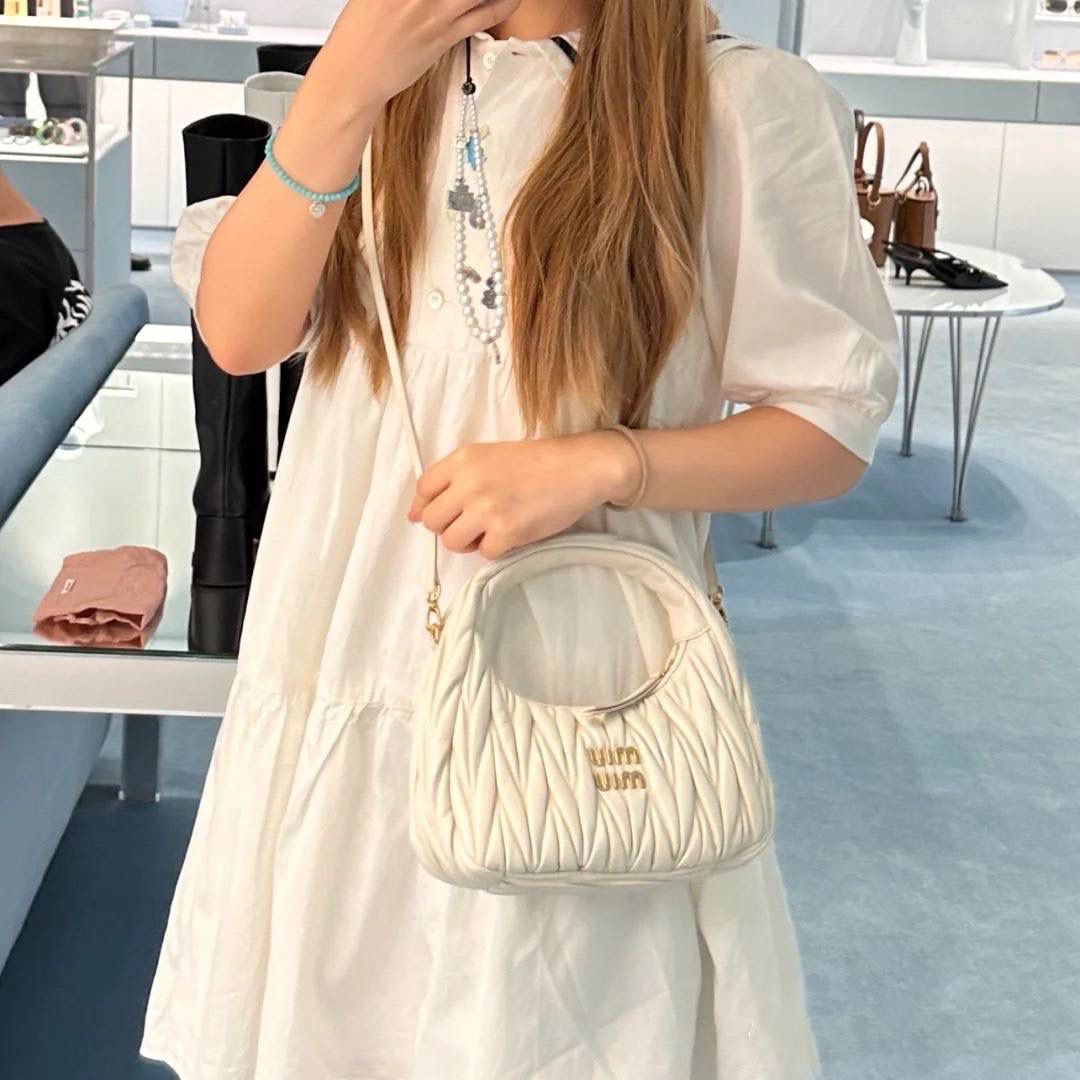 Miu Miu Quilted Leather Handbag: Chic and Versatile Designer Bag