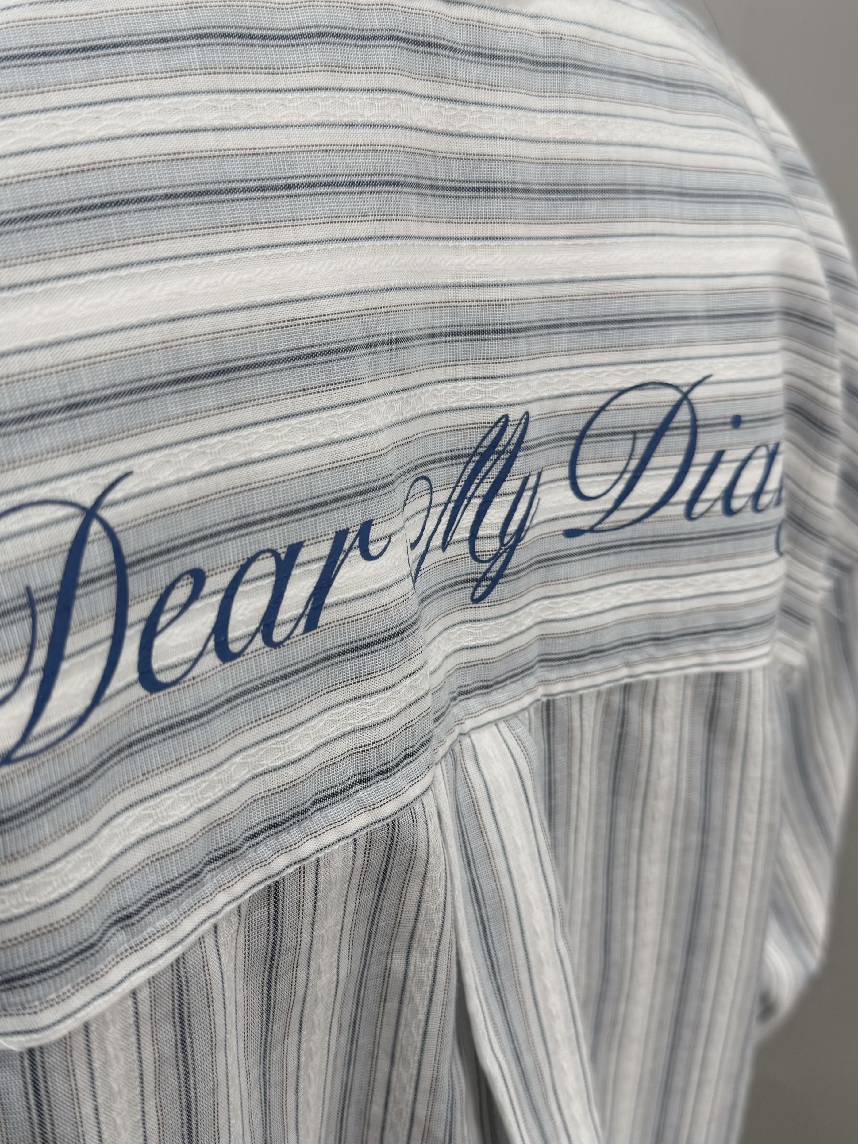 I64 後字條子恤衫