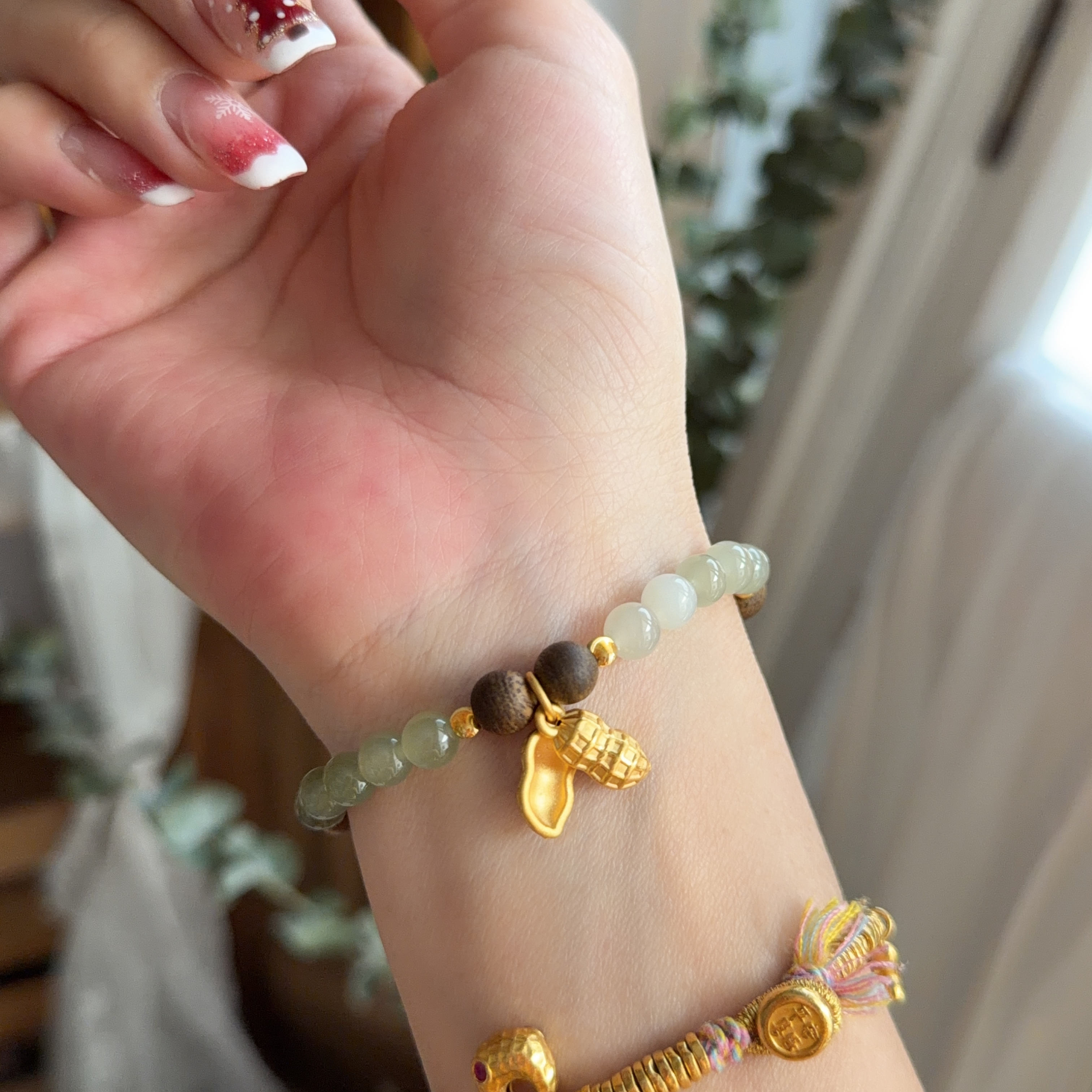 6mm和田玉+沉香襯999足金花生手串