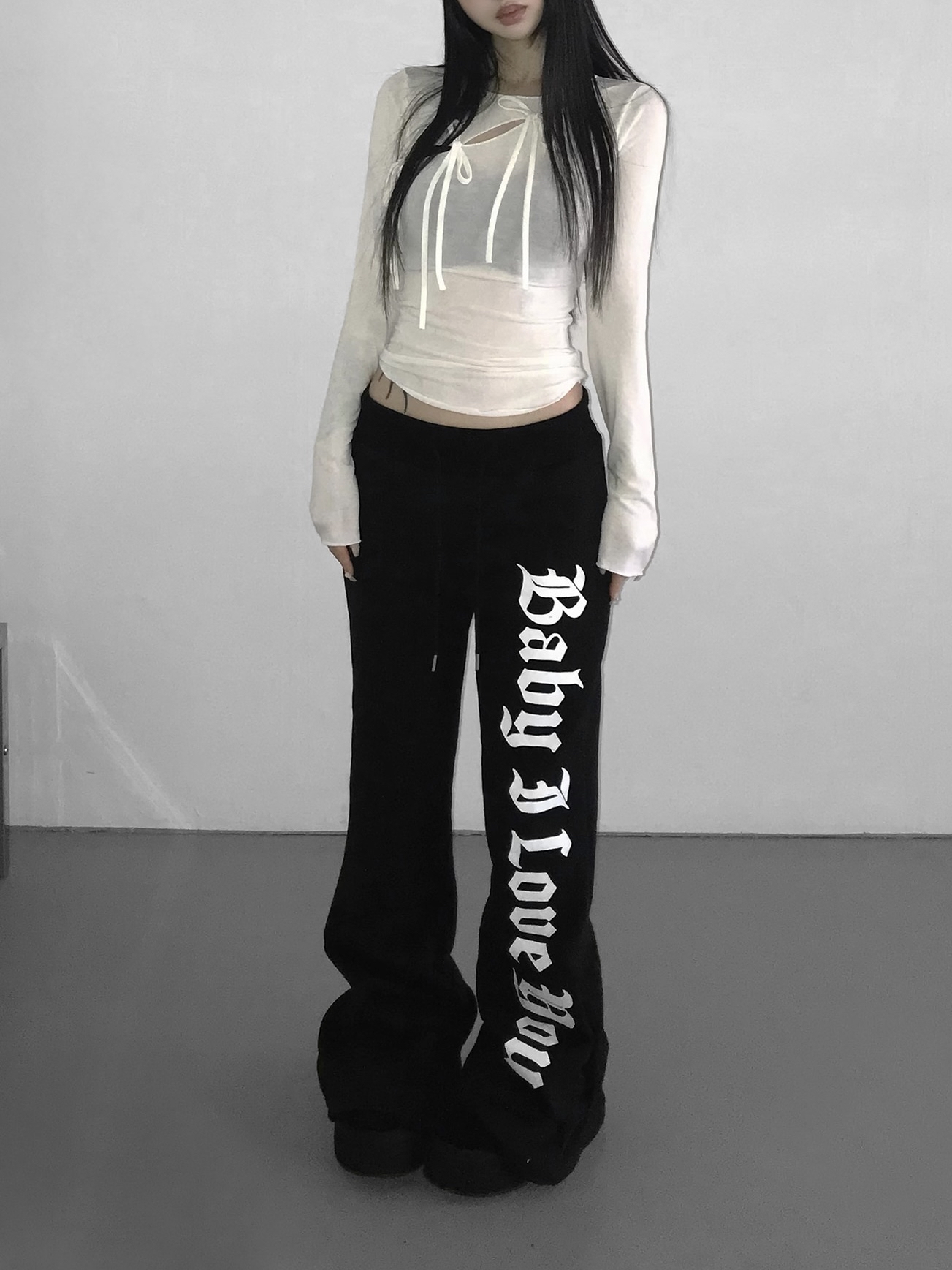 Sheer Tie-Front Cross Graphic Top