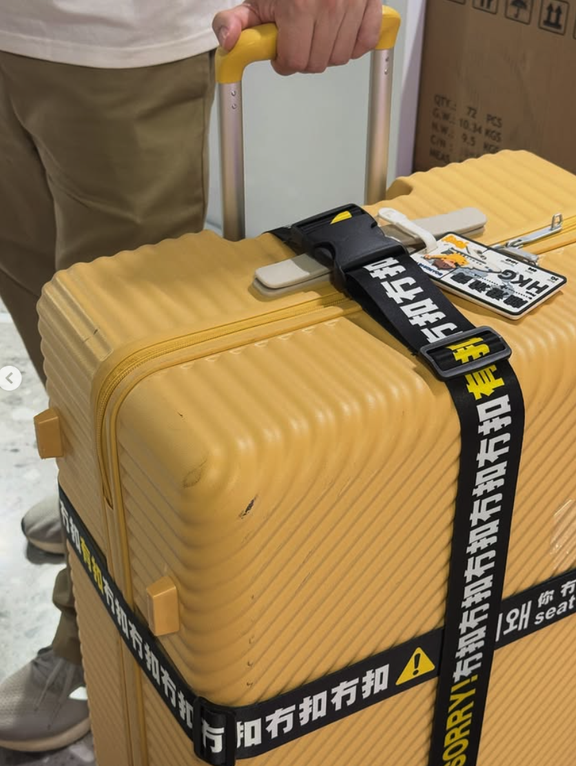SORRY！冇扣 行李安全帶