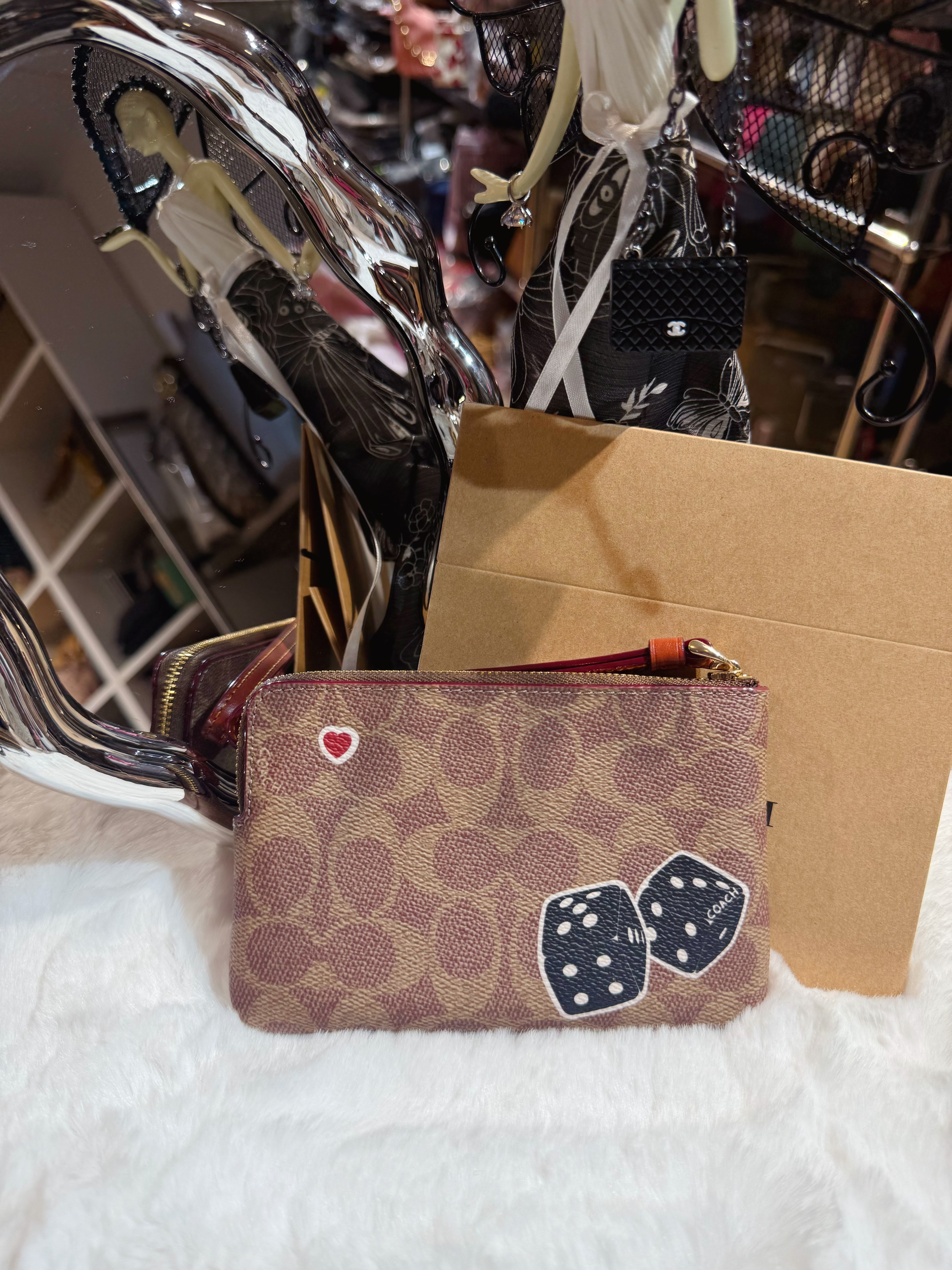 Coach wristlet logo/m/dinosaur