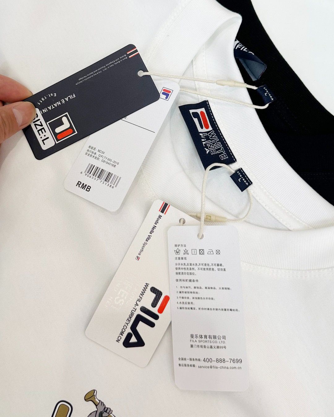 $195件。2件起$185件。FILA棒球主題系列印花短袖T恤