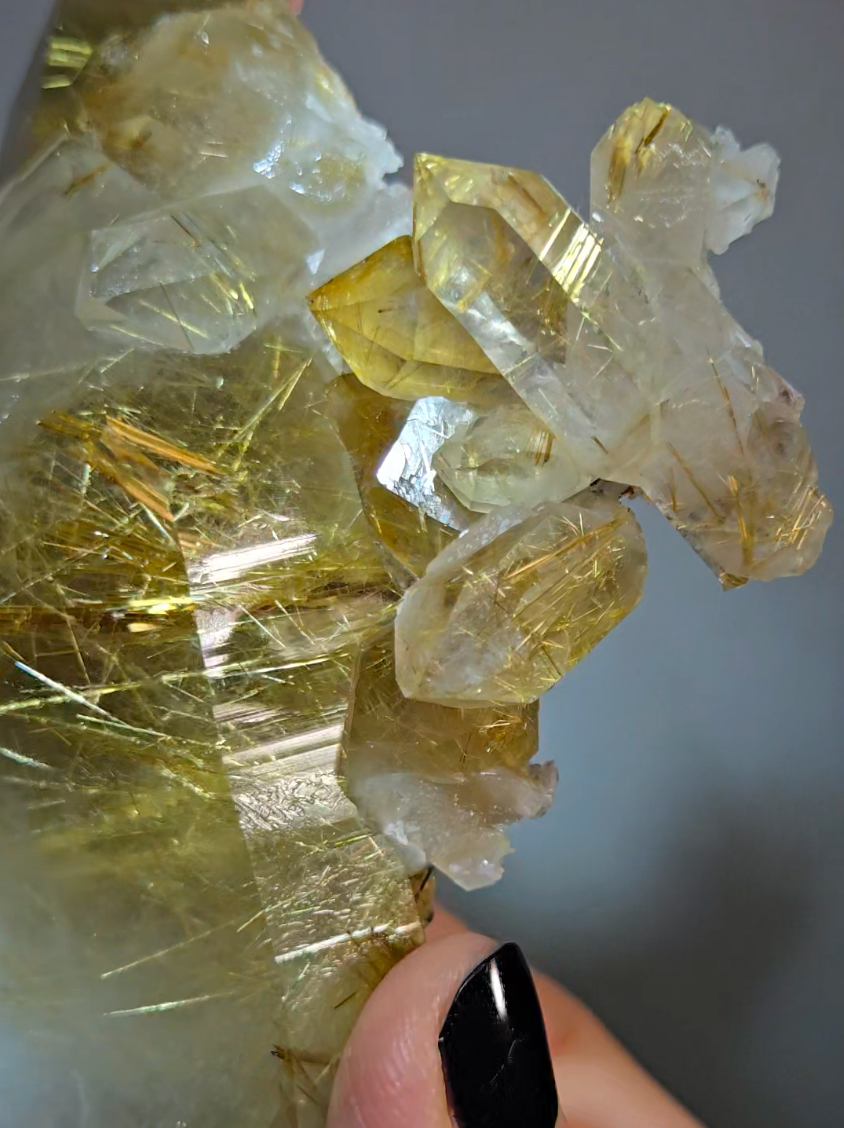 Golden titanium rutiles on black hematite in quartz cluster - RT1443