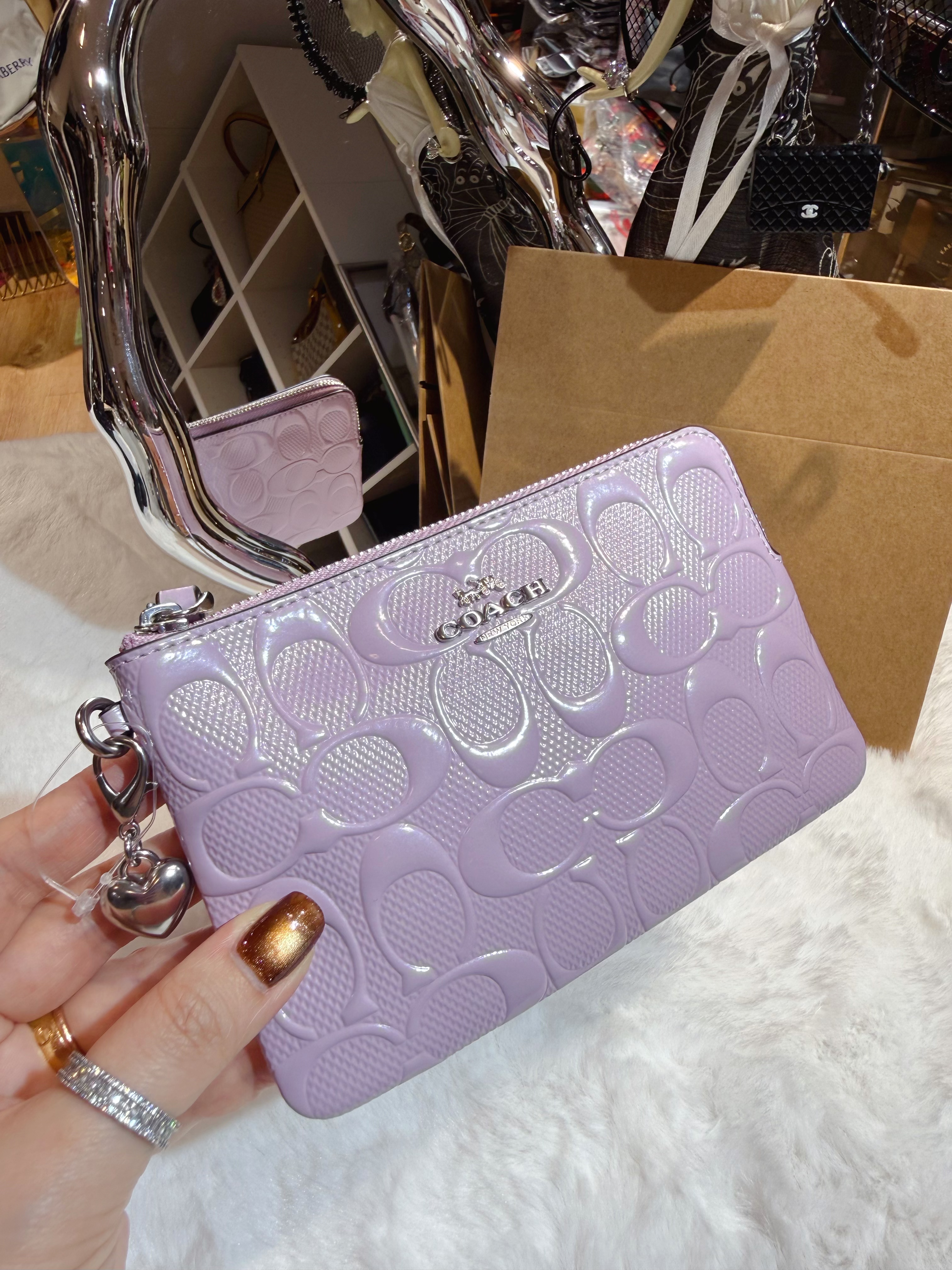 Coach wristlet pat/purple/m