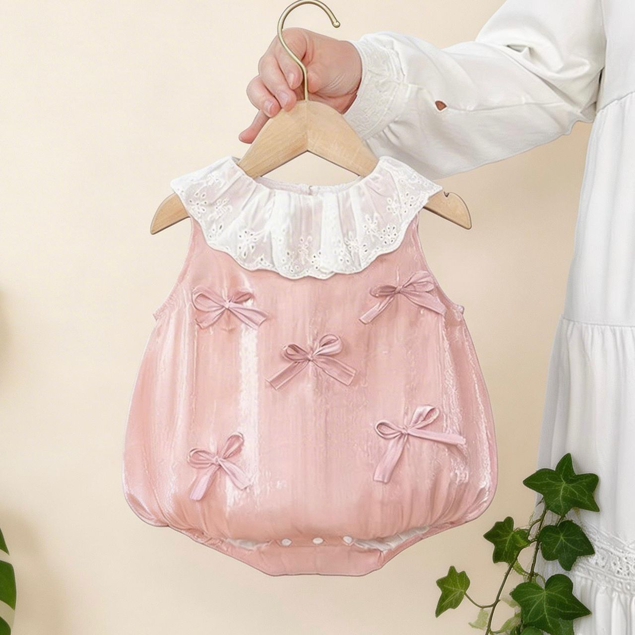 561251 | Vintage-Inspired Pink Velvet Baby Romper with Lace Collar